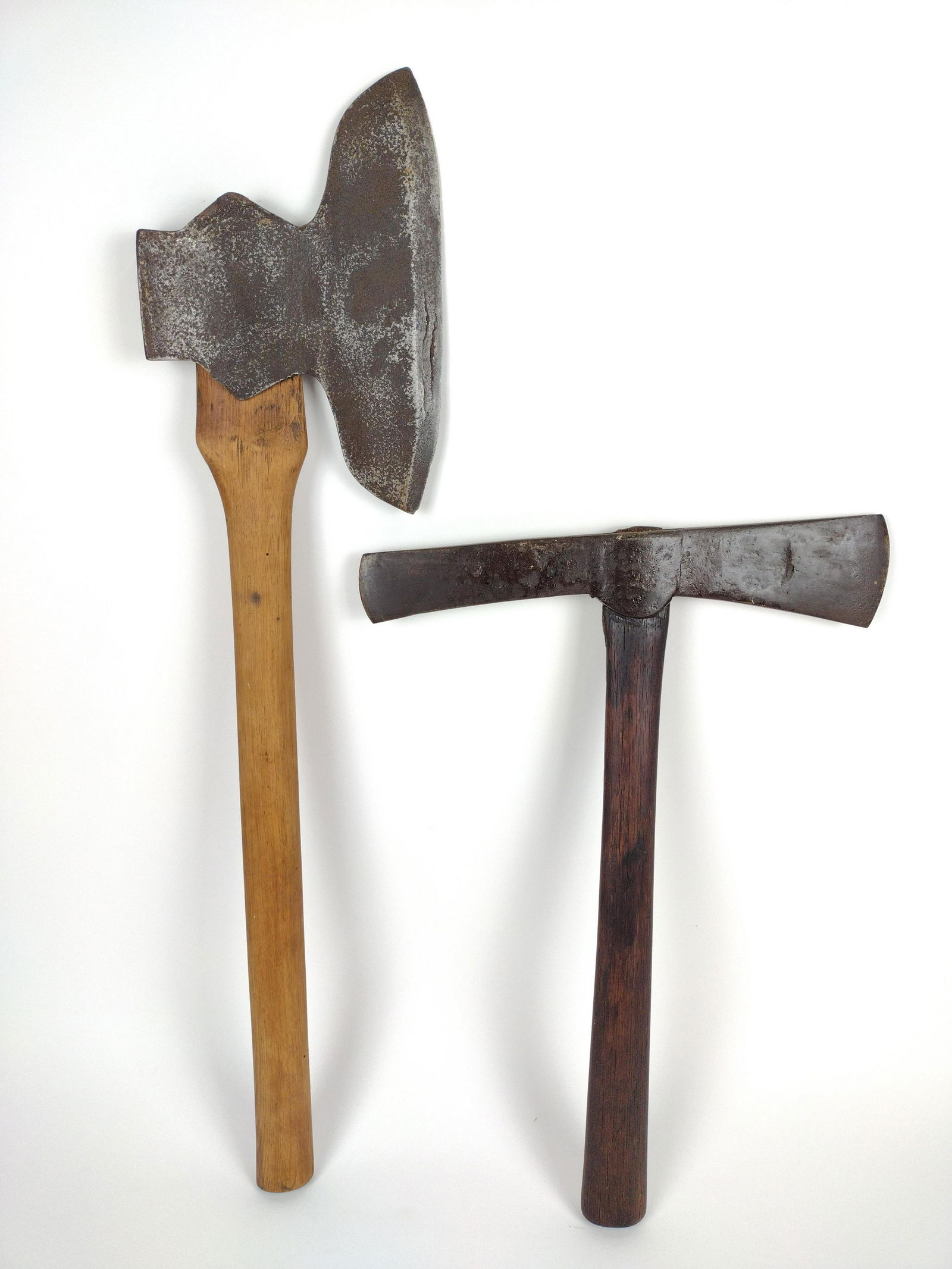 Broad Axe and Mattock: Both unmarked. 20-1/2" to 31" long. From the Estate of Stephen Pancoe, York Haven, PA. IMPORTANT: Before bidding, please read the terms and conditions. When you registered for the auction you agreed t