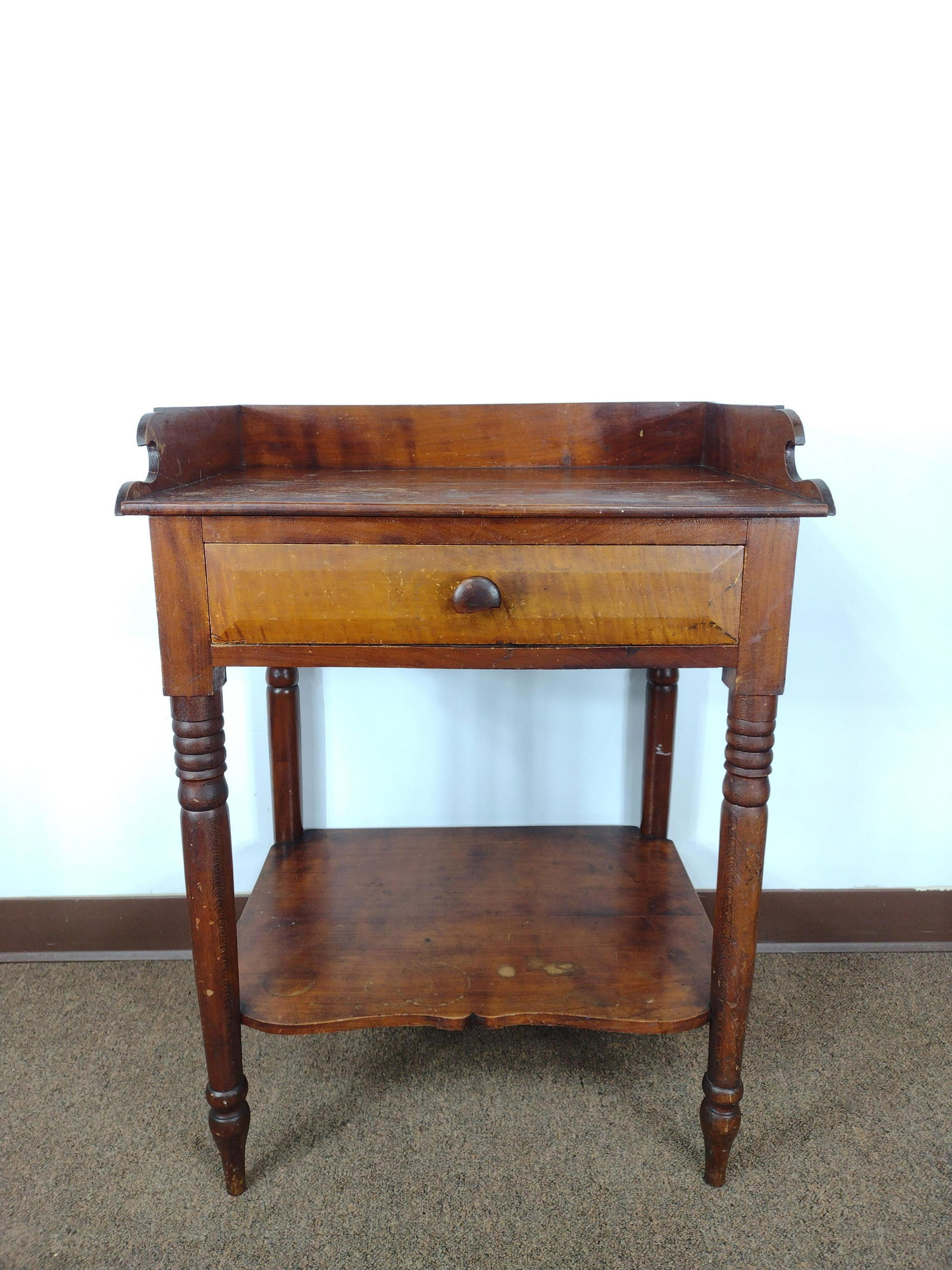 Single Drawer Wash Stand: 24 1/2" wide X 18" deep X 32" high. Top is split. Has some finish loss and discoloration. IMPORTANT: Before bidding, please read the terms and conditions. When you registered for the auction you agree