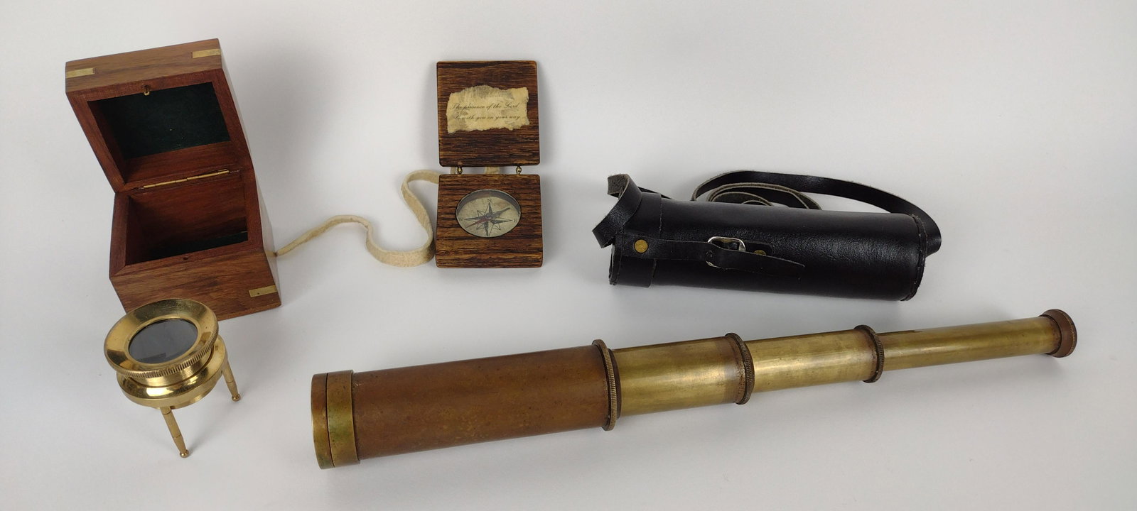 Spyglass, Compass, and Magnifying Glass: Spyglass: 6" (closed) to 14-1/2" (extended) long. From the Estate of Stephen Pancoe, York Haven, PA. IMPORTANT: Before bidding, please read the terms and conditions. When you registered for the auctio