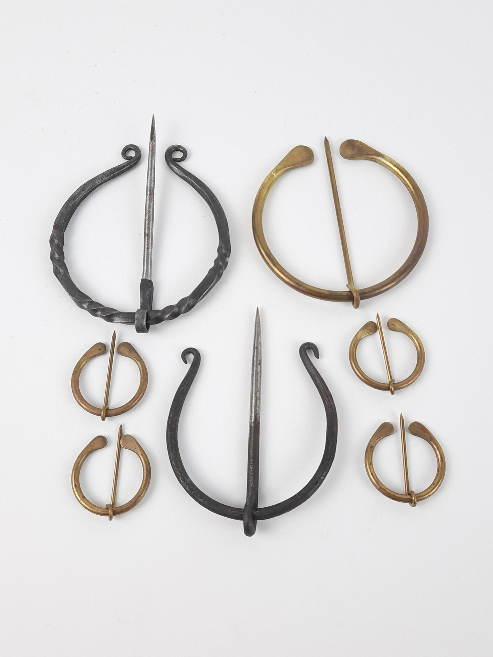 7 Cloak Pins: 2-1/2" to 4" long. From the Estate of Stephen Pancoe, York Haven, PA. IMPORTANT: Before bidding, please read the terms and conditions. When you registered for the auction you agreed to these terms and