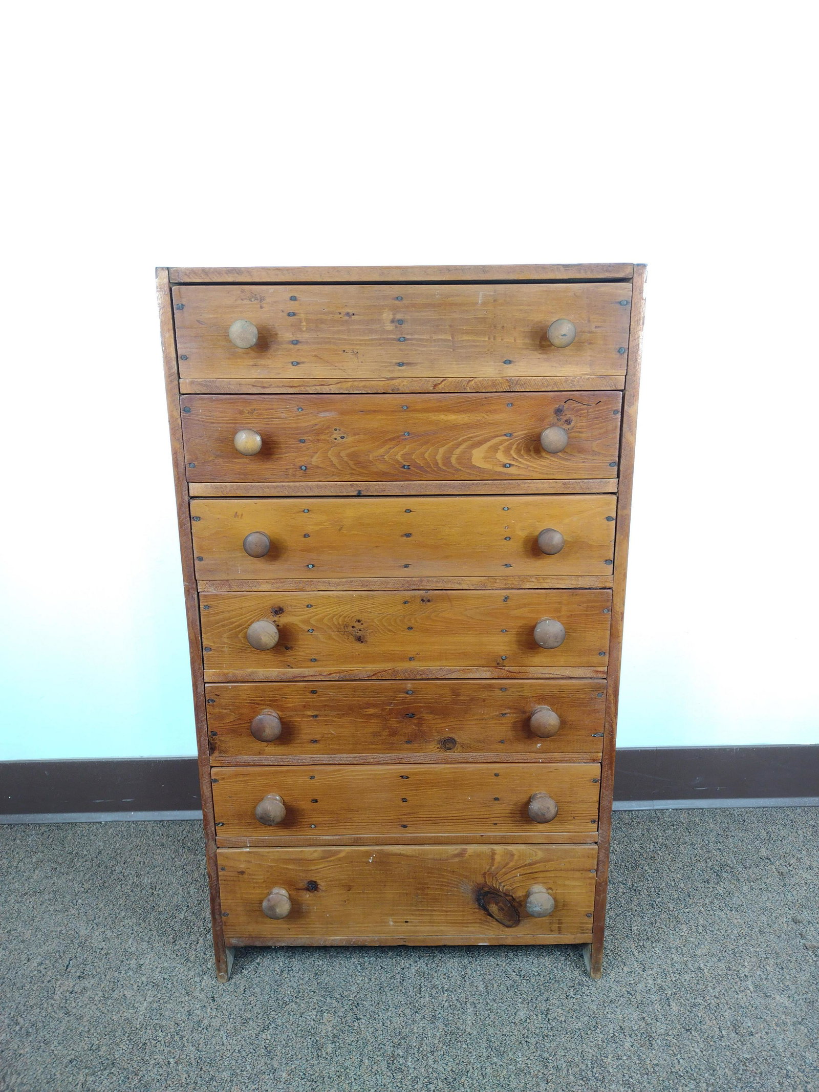 Seven Drawer Small Chest: 17 1/4" wide X 10 1/4" deep X 30 1/4" high. From the Estate of Stephen Pancoe, York Haven, PA. IMPORTANT: Before bidding, please read the terms and conditions. When you registered for the auction you 