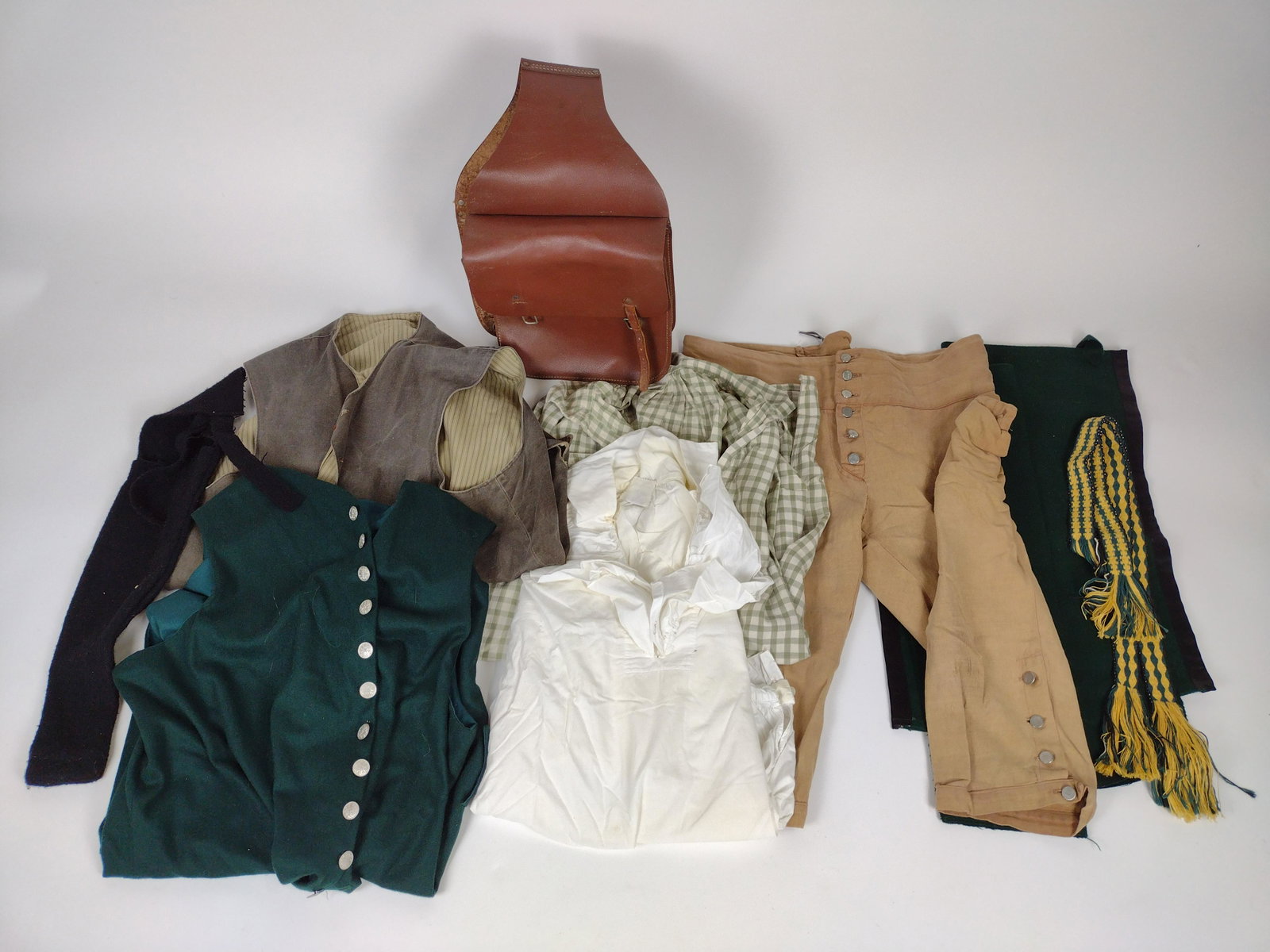 8 Pcs Reenactor's Clothing incl Druid's Oak: Pants 39" waist. Shirts and Vests approx. 31" to 39" long. Saddle bags: 11" wide X 19" high. From the Estate of Stephen Pancoe, York Haven, PA. IMPORTANT: Before bidding, please read the terms and con