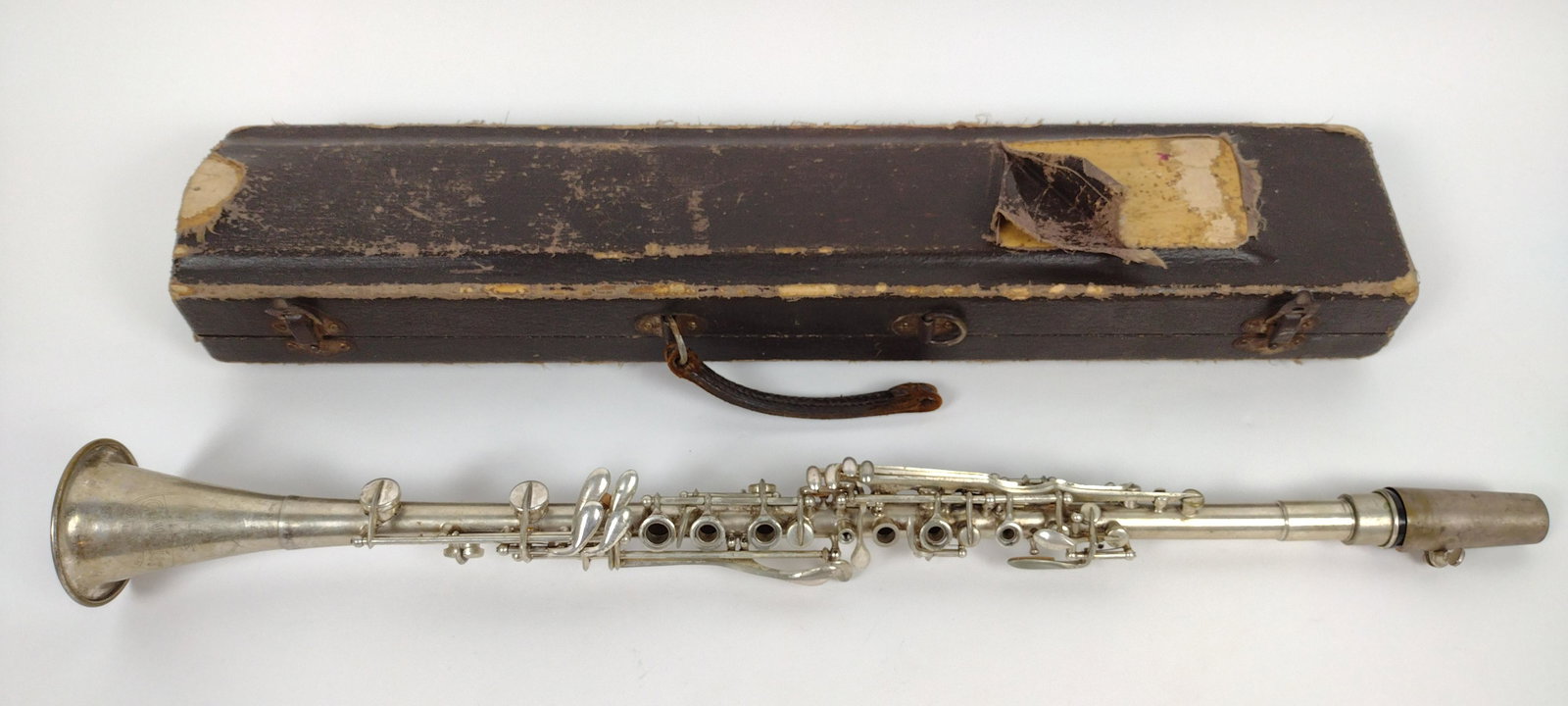 Cavalier Clarinet with Case: Some losses to case. IMPORTANT: Before bidding, please read the terms and conditions. When you registered for the auction you agreed to these terms and will be required to comply with them.
