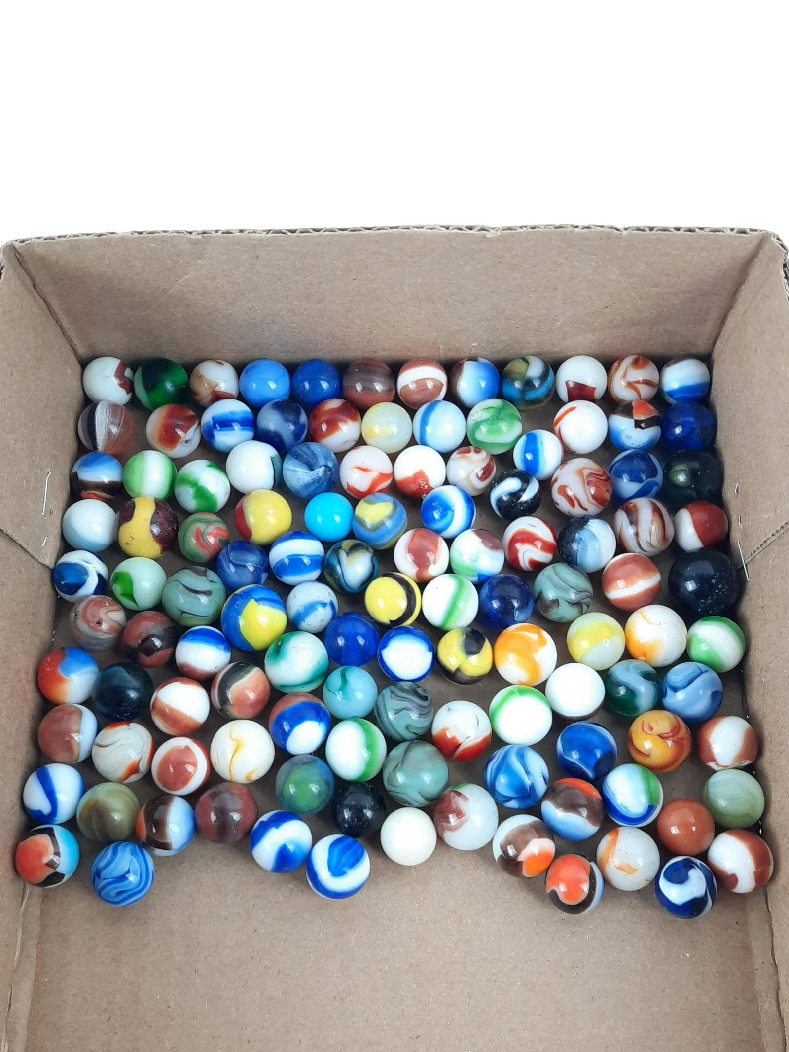 111 Vintage Marbles: 1/2" to 3/4" diameter. IMPORTANT: Before bidding, please read the terms and conditions. When you registered for the auction you agreed to these terms and will be required to comply with them.