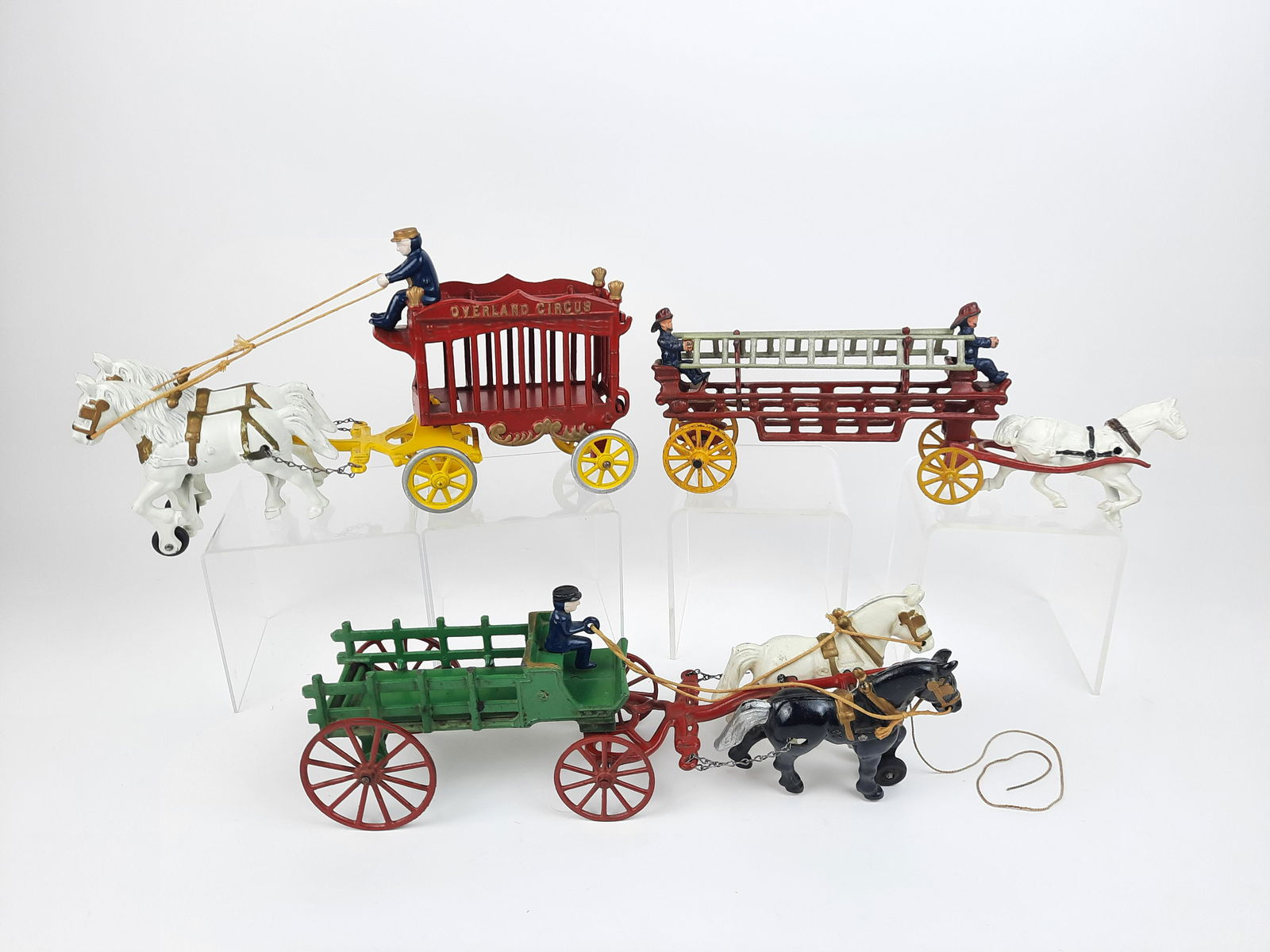 3 Cast Iron Toys incl Fire Engine and Circus Wagon (1 of 3)