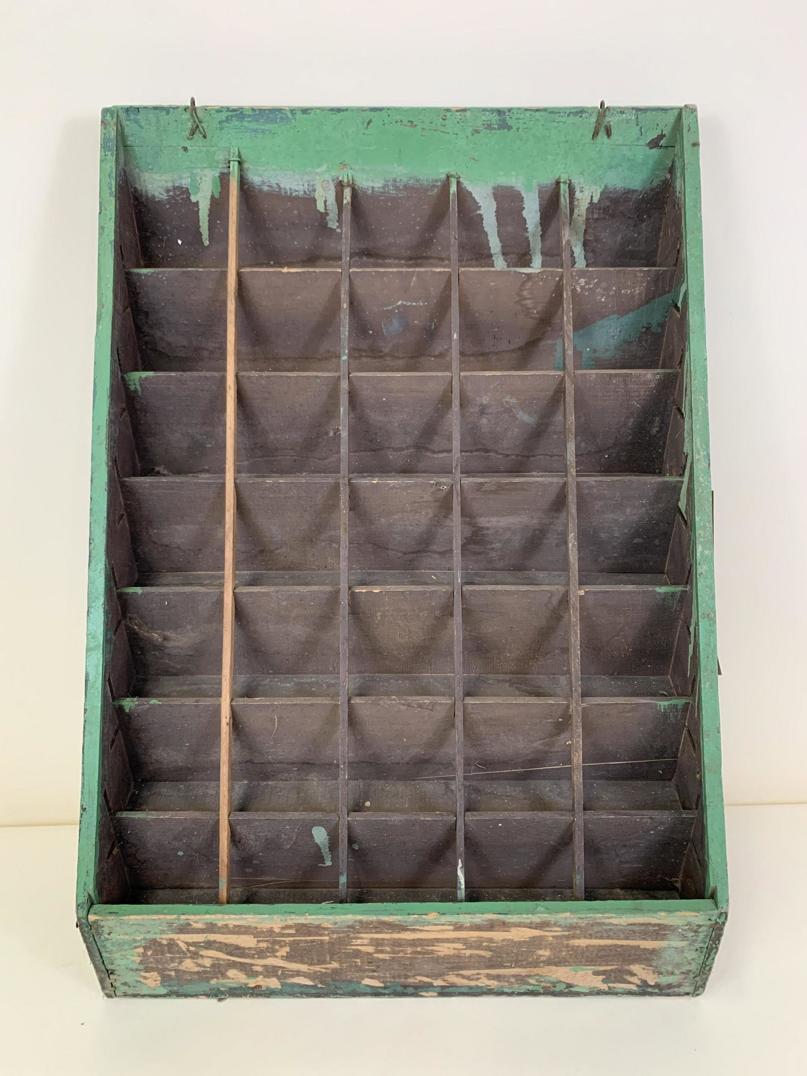 Empire Seed Co. Inc. Seed Packet Display Stand: 35 slots. 28” high x 18-1/2” wide x 3-3/4” deep. IMPORTANT: Before bidding, please read the terms and conditions. When you registered for the auction you agreed to these terms and wi