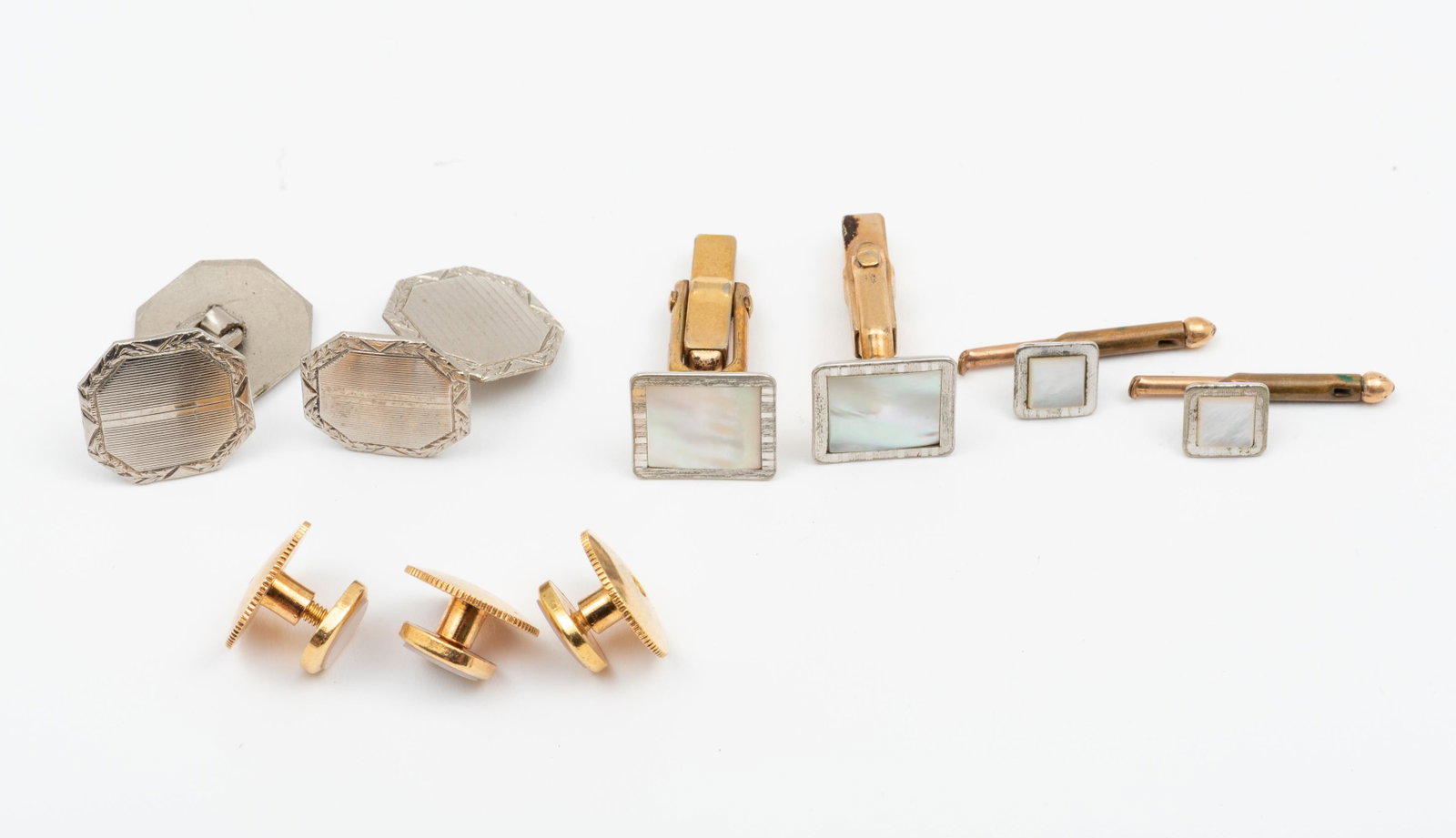 Cufflinks and Vest Buttons: Swank mother of pearl cufflinks 1/2" wide. Mother of pearl vest buttons marked Germany 1/4" wide. IMPORTANT: Before bidding, please read the terms and conditions. When you registered for the auction y