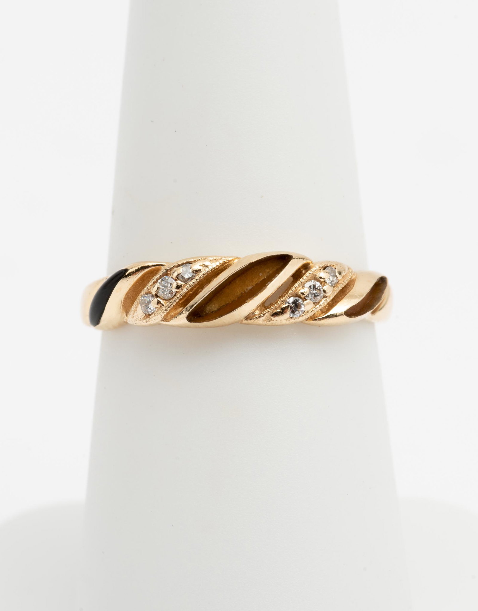 14K Diamond Ring: 6 -2 point diamonds, .12 CTW. 1.4 dwt. Size 7. IMPORTANT: Before bidding, please read the terms and conditions. When you registered for the auction you agreed to these terms and will be required to co