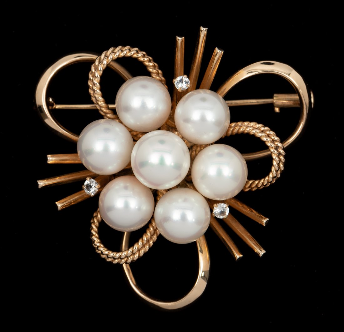 14K & Pearl Brooch: Pearls 7.6mm. Three 2 pt white sapphires. 1-1/2" high x 1-1/2" at widest point. 6.8 dwt. IMPORTANT: Before bidding, please read the terms and conditions. When you registered for the auction you agreed