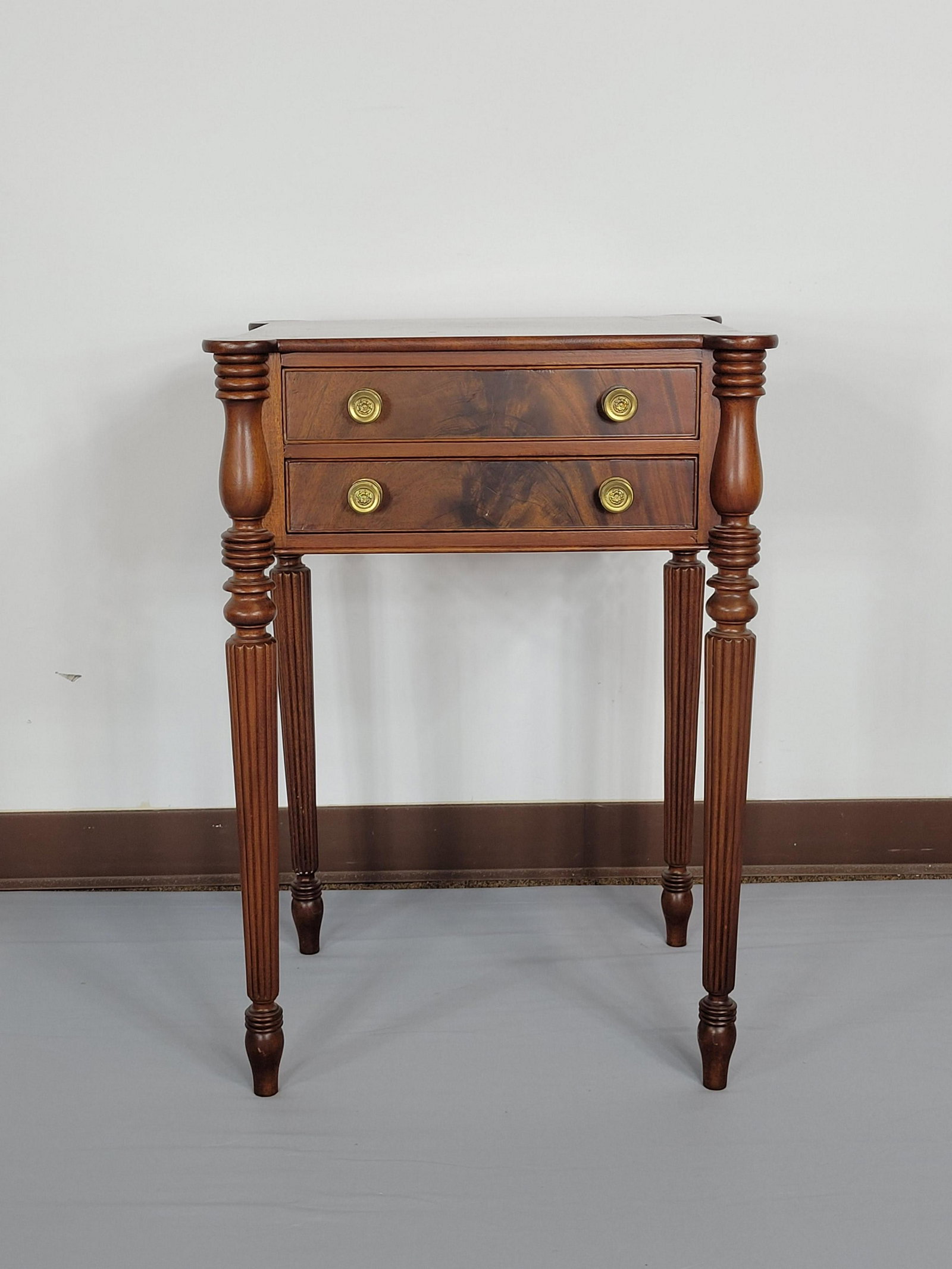 Two Drawer Work Table: 20" wide X 17" deep X 28 1/2" high. MG IMPORTANT: Before bidding, please read the terms and conditions. When you registered for the auction you agreed to these terms and will be required to comply wit