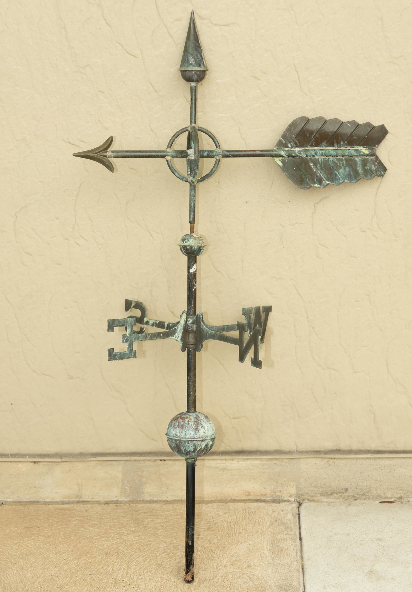 Weather Vane: Weather vane with compass directions and arrow. 47" high. Wear consistent with use. DP IMPORTANT: Before bidding, please read the terms and conditions. When you registered for the auction you agreed t