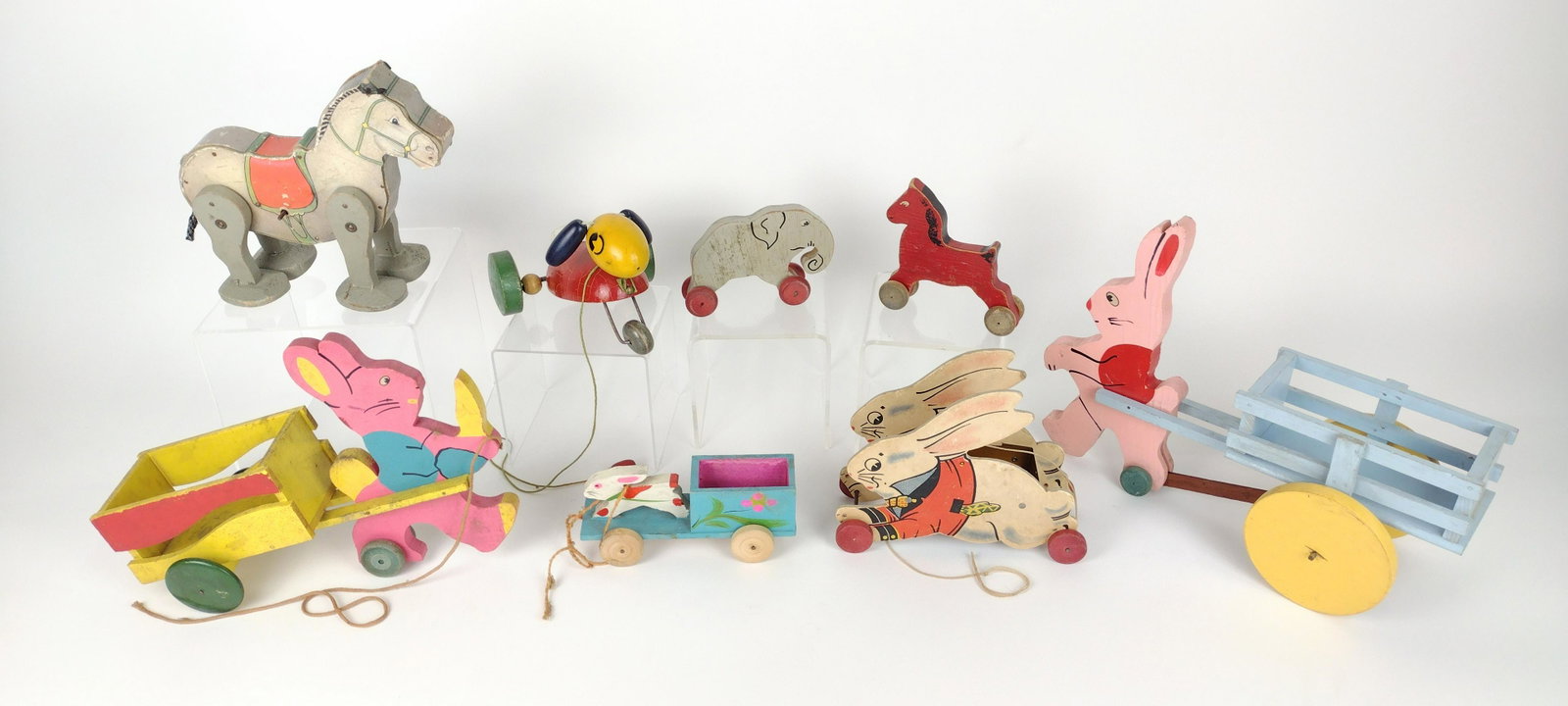 8 Vintage Wood Toys incl. Easter: 3" to 10" high. IMPORTANT: Before bidding, please read the terms and conditions. When you registered for the auction you agreed to these terms and will be required to comply with them.