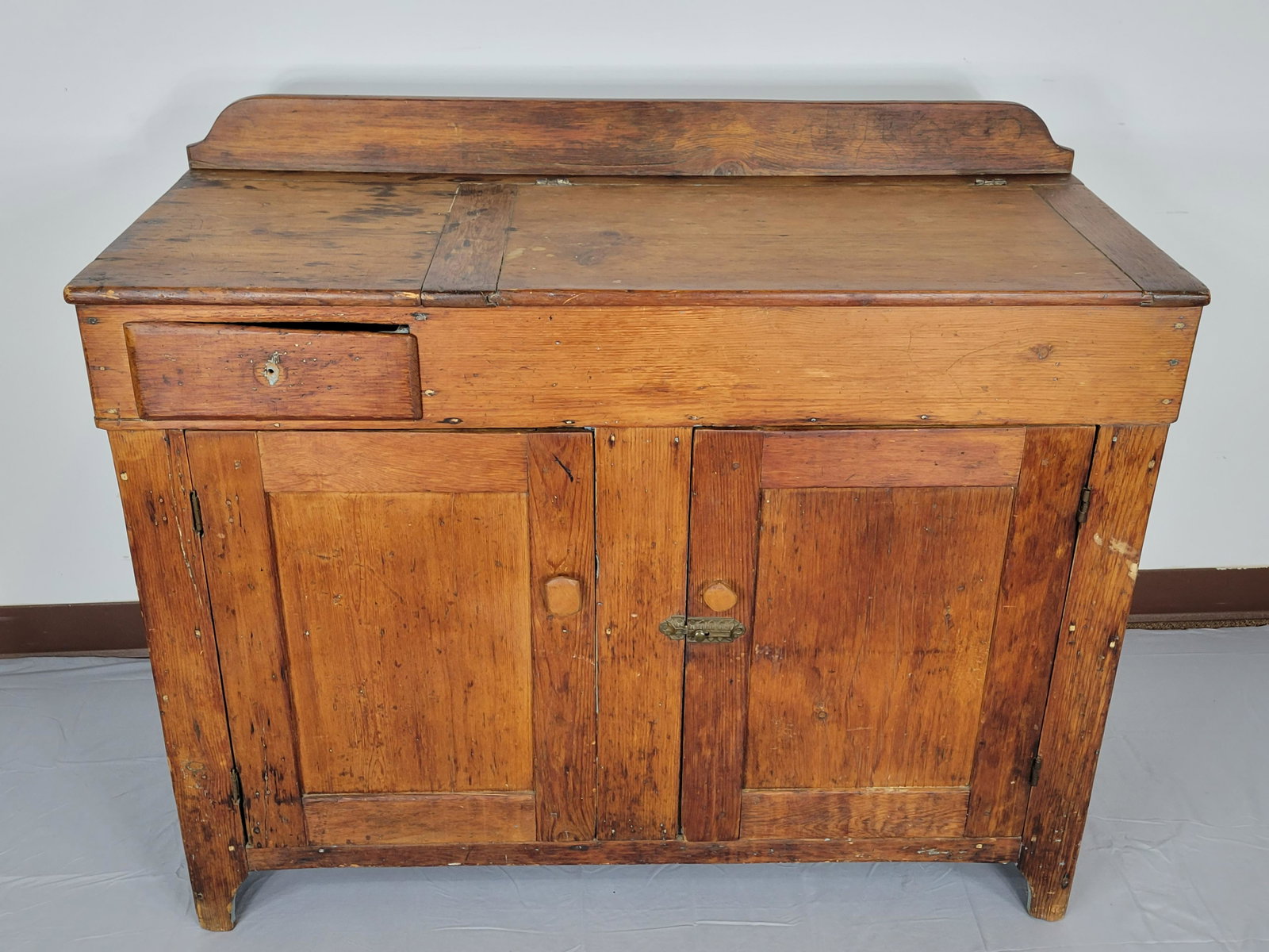 Dry Sink: 43 1/2" wide X 18" deep X 36 1/2" high. Missing drawer pull. Some finish loss. IMPORTANT: Before bidding, please read the terms and conditions. When you registered for the auction you agreed to these 