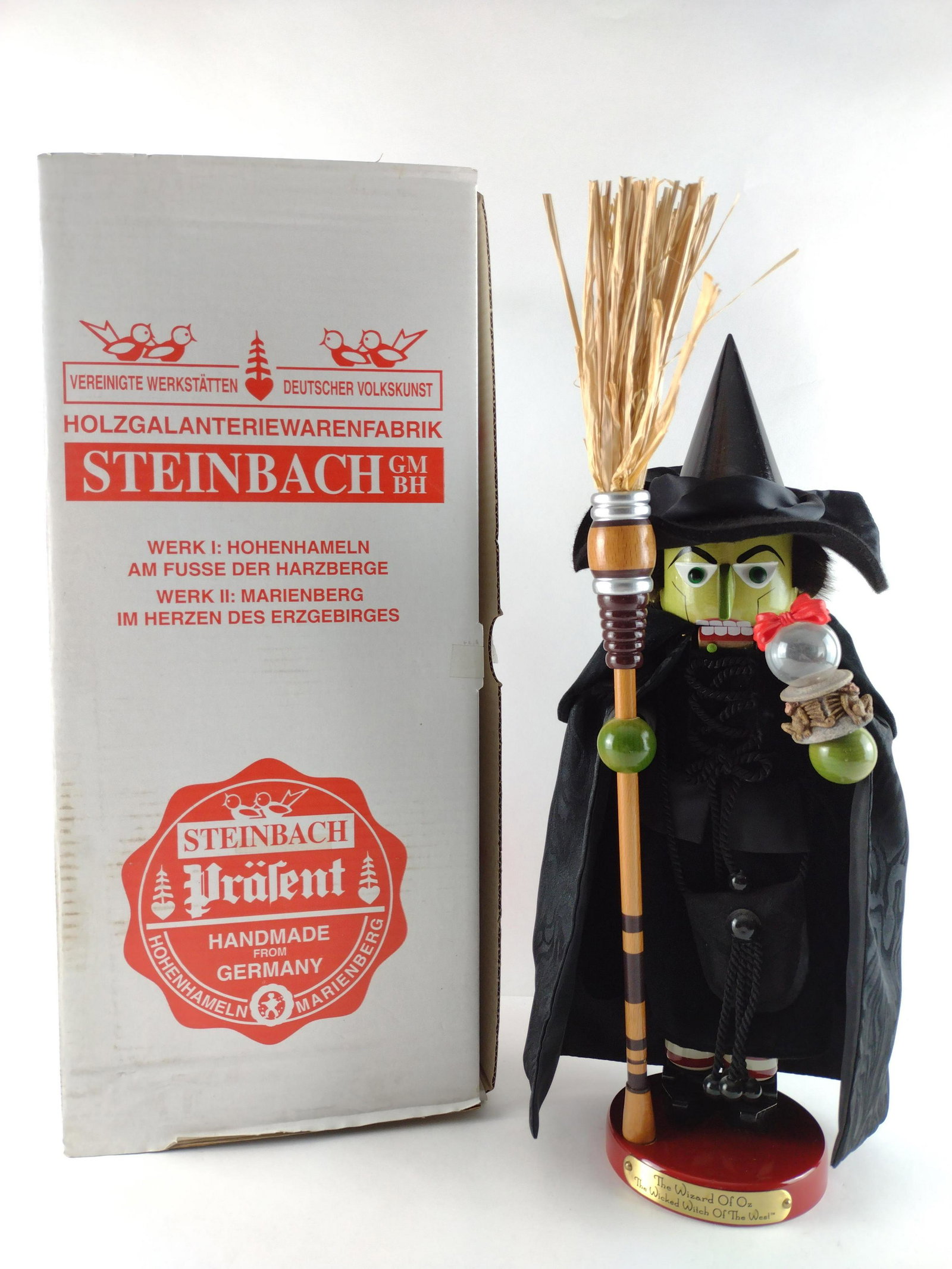 Wicked Witch of the West Steinbach Nutcracker: Includes original box. 20" high x 4-3/4" diameter base. IMPORTANT: Before bidding, please read the terms and conditions. When you registered for the auction you agreed to these terms and will be requi