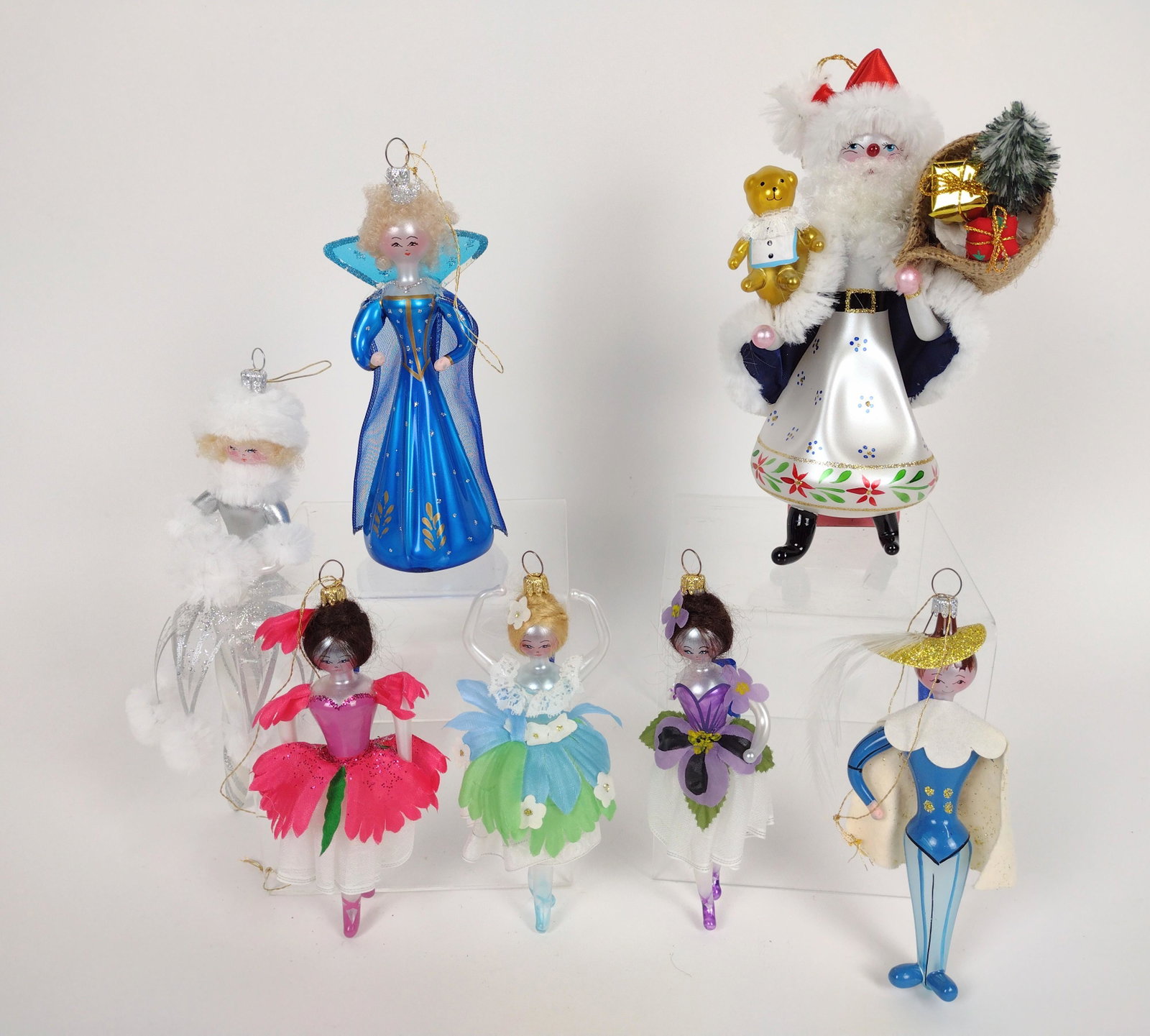 7 Glass Christmas Ornaments incl. Ballerinas: 6" to 9" high. One with loss. DM IMPORTANT: Before bidding, please read the terms and conditions. When you registered for the auction you agreed to these terms and will be required to comply with them