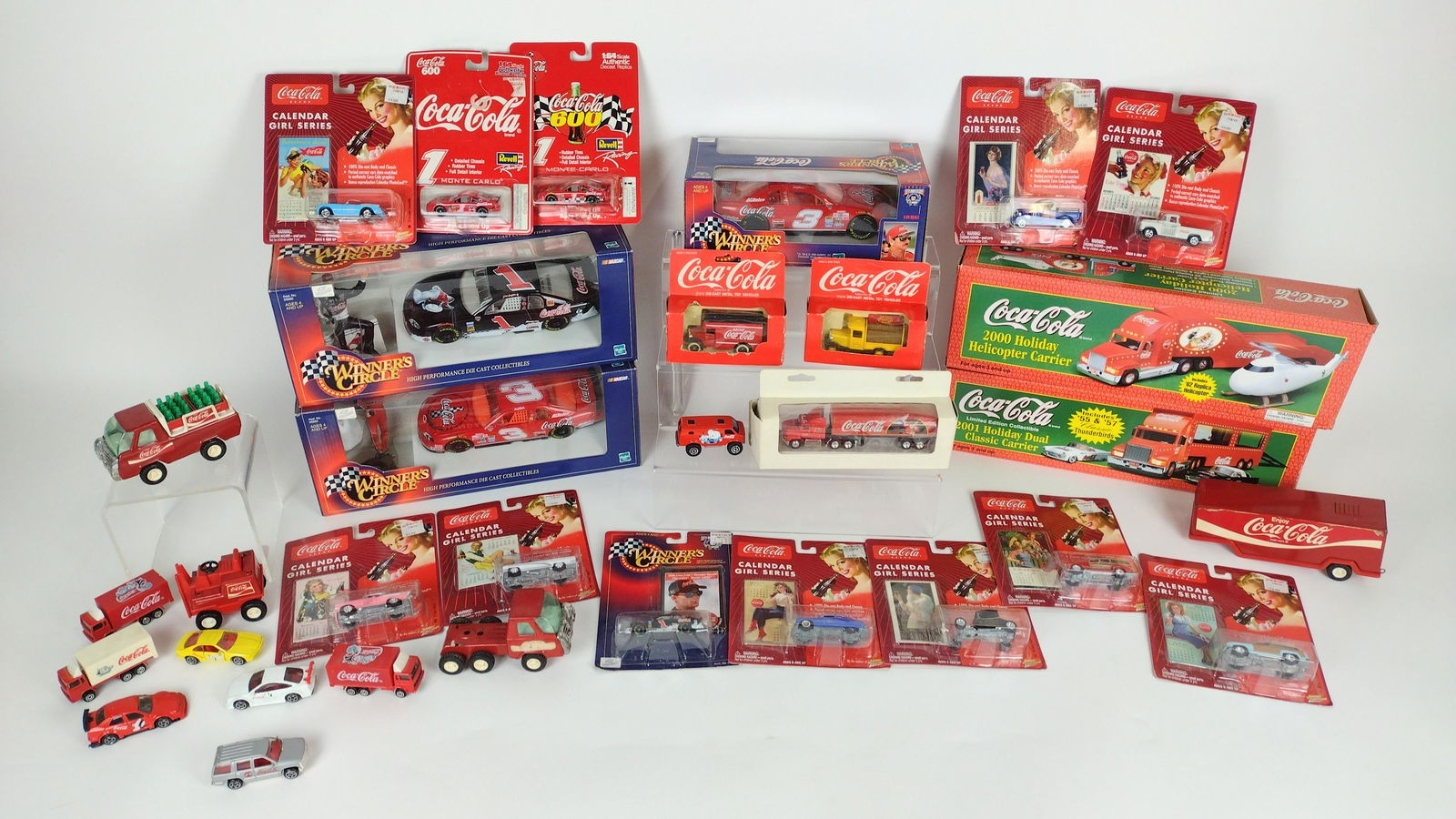 32 Coca-Cola Cars and Trucks incl Die Cast: Includes 2000 and 2001 Holiday Carriers, Winner's Circle, Calendar Girl Series, and more. Various scales. DM IMPORTANT: Before bidding, please read the terms and conditions. When you registered for th
