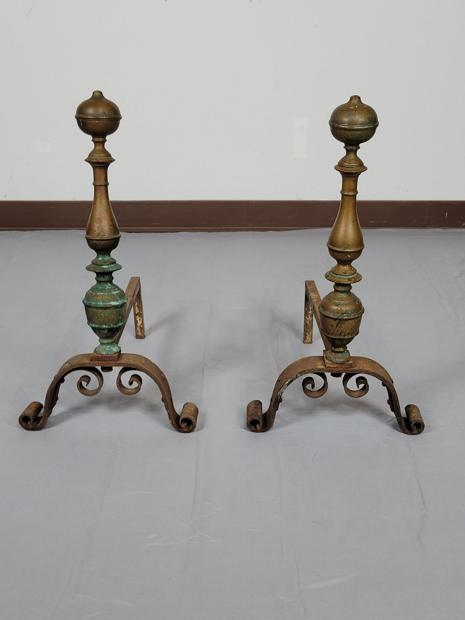 Fireplace Andirons: 12" wide X 17" deep X 22" high. Both have oxidation and rust. MG. IMPORTANT: Before bidding, please read the terms and conditions. When you registered for the auction you agreed to these terms and wil