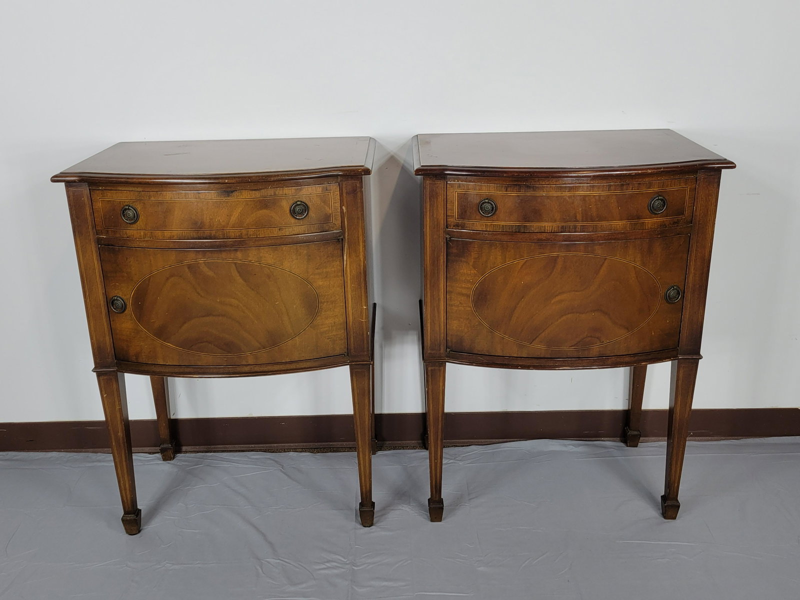 Pair Of Mahogany Accent Cabinets: 26" wide X 18" deep X 35" high. Both have minor scratches and finish loss. MG. IMPORTANT: Before bidding, please read the terms and conditions. When you registered for the auction you agreed to these 
