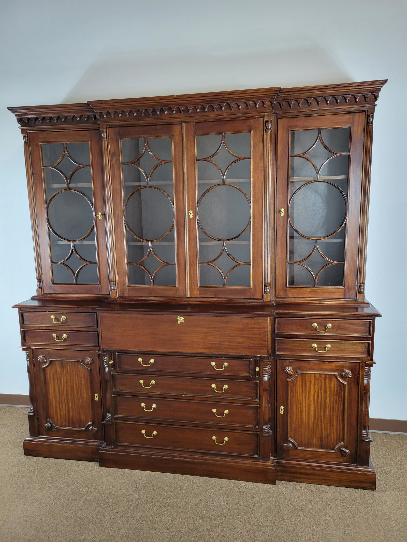 Vintage Butler's Breakfront: In two pieces. 83" wide X 20" deep X 84 1/2" high. MG. IMPORTANT: Before bidding, please read the terms and conditions. When you registered for the auction you agreed to these terms and will be requir