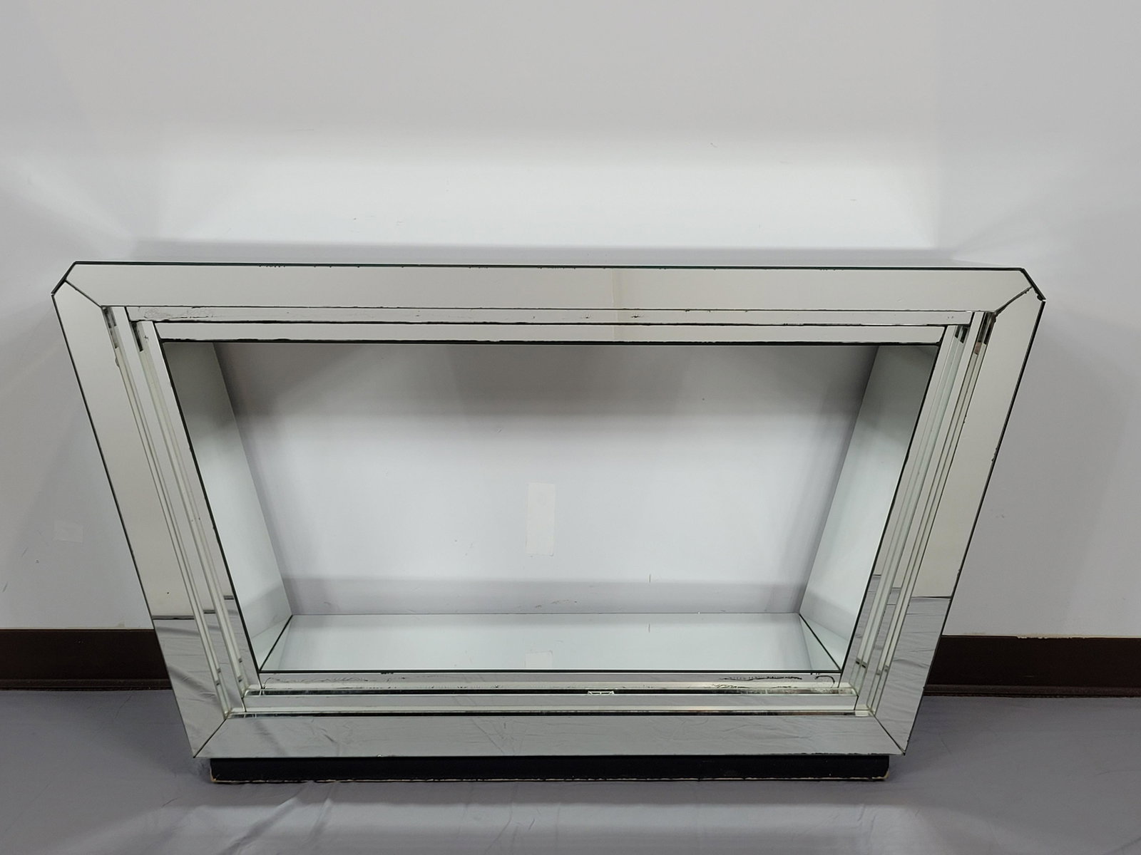 Mirrored Console Table: 54 1/4" wide X 15" deep X 30" high. MG. IMPORTANT: Before bidding, please read the terms and conditions. When you registered for the auction you agreed to these terms and will be required to comply wi