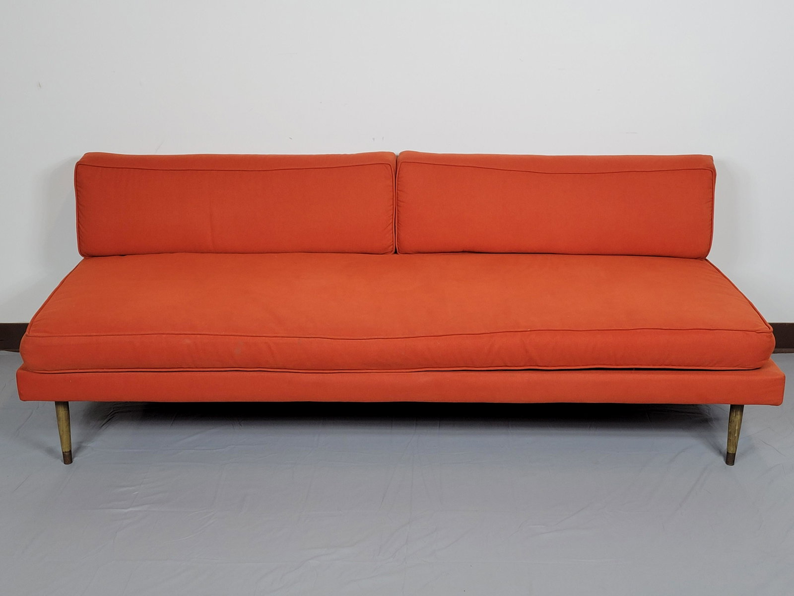 Mid Century Sofa: 74 1/2" wide X 32" deep X 25 1/2" high. Has areas of discoloring. MG. IMPORTANT: Before bidding, please read the terms and conditions. When you registered for the auction you agreed to these terms and