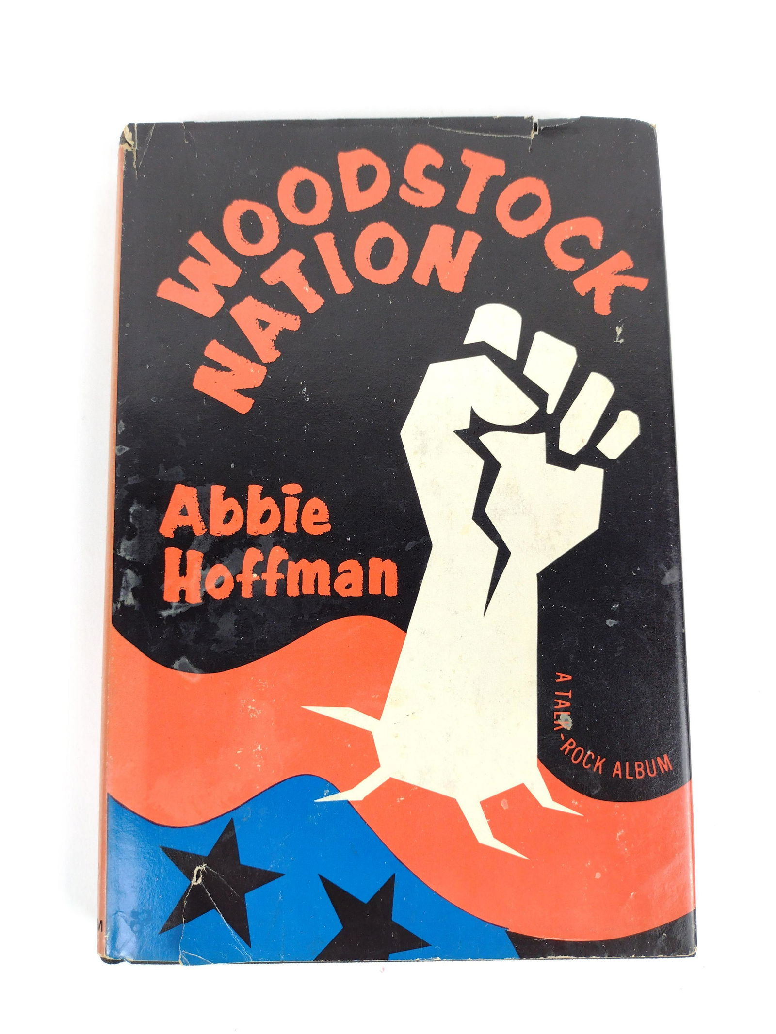Woodstock Nation by Abbie Hoffman First Printing: Copyright 1969. Some marks and tears to dust jacket. DM IMPORTANT: Before bidding, please read the terms and conditions. When you registered for the auction you agreed to these terms and will be requi