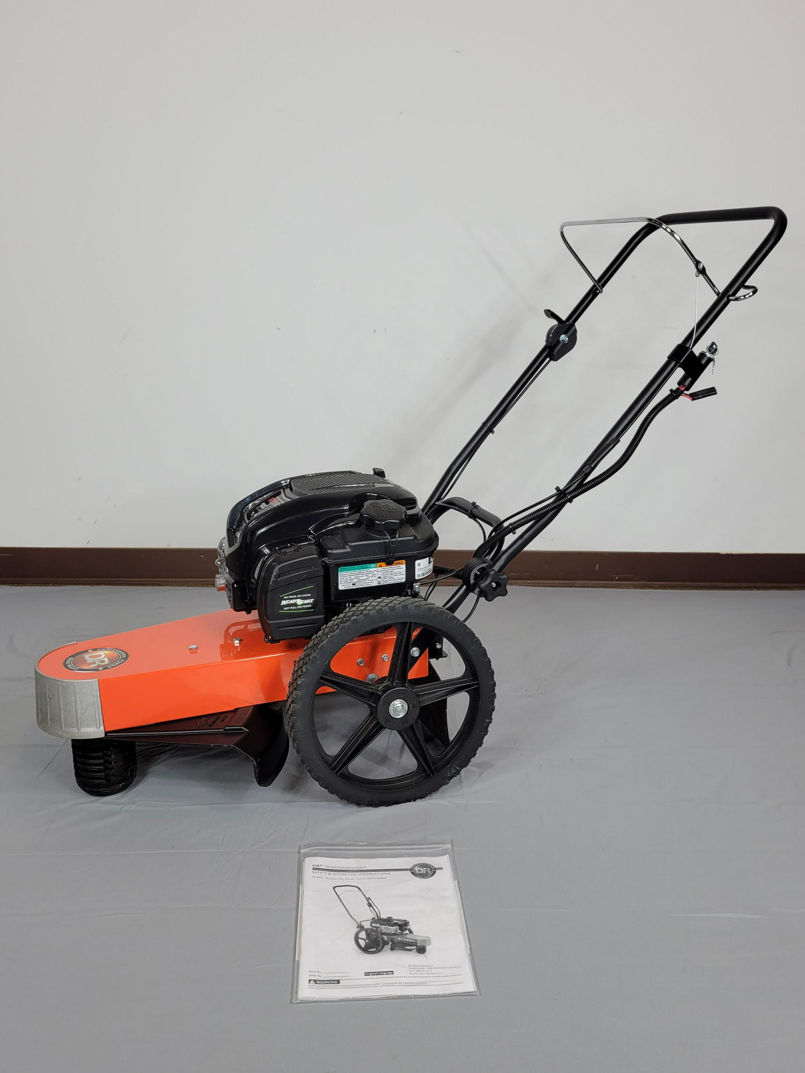Dr Trimmer/Mower: Briggs & Stratton 675EXi Series motor. Has manual. 163cc OHV. Pulls but does not start. MG. IMPORTANT: Before bidding, please read the terms and conditions. When you registered for the auction you agr