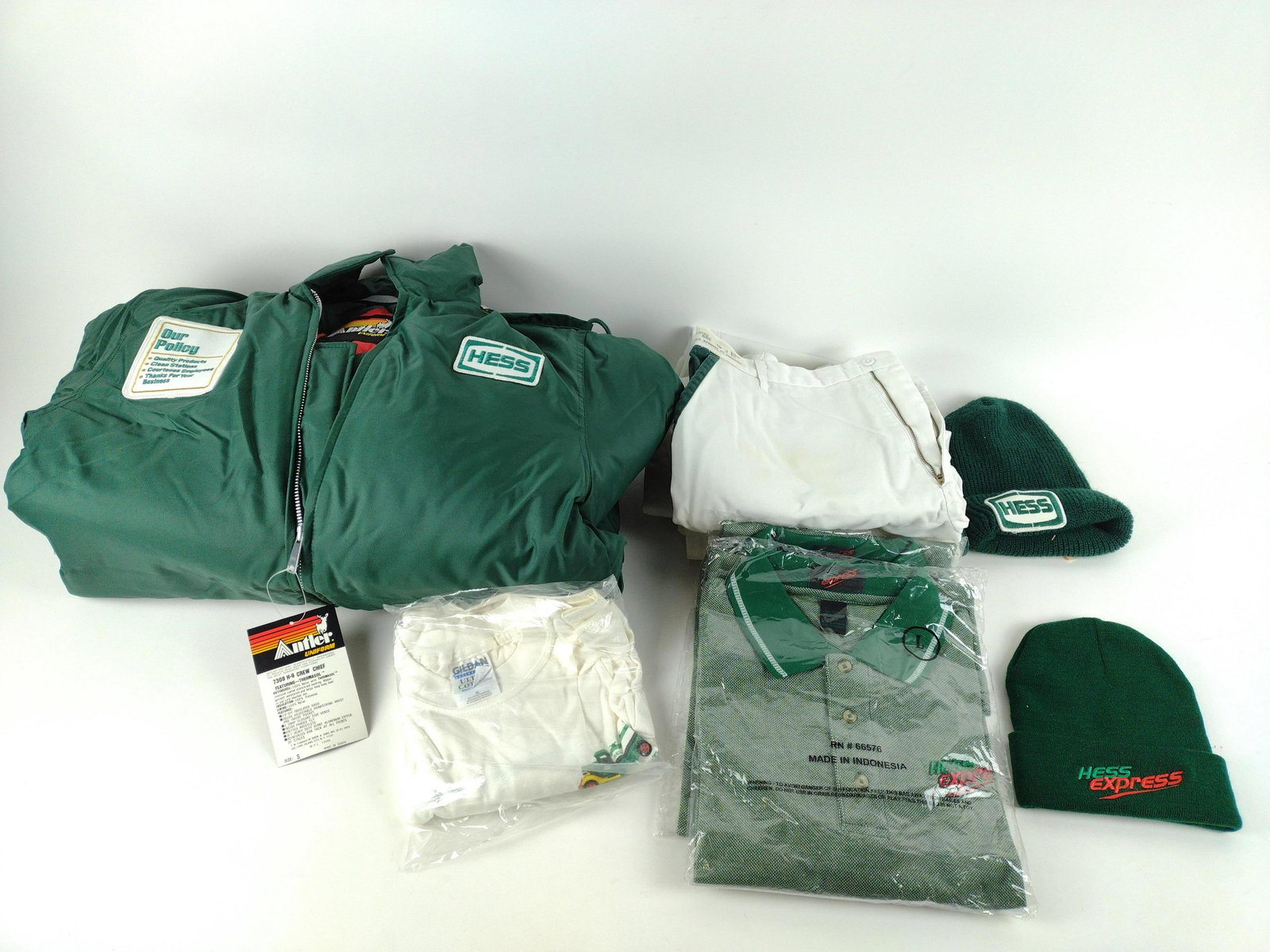 8 Hess Gas Station Uniform Garments: Includes 38 pants and L to XXL shirts. Parka is S. JK IMPORTANT: Before bidding, please read the terms and conditions. When you registered for the auction you agreed to these terms and will be require