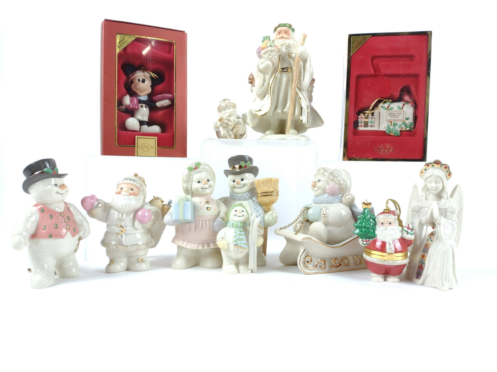 10 Lenox Holiday Figurines and Ornaments: Some with original box. 1 3/4" to 6 3/4" high. JK IMPORTANT: Before bidding, please read the terms and conditions. When you registered for the auction you agreed to these terms and will be required to