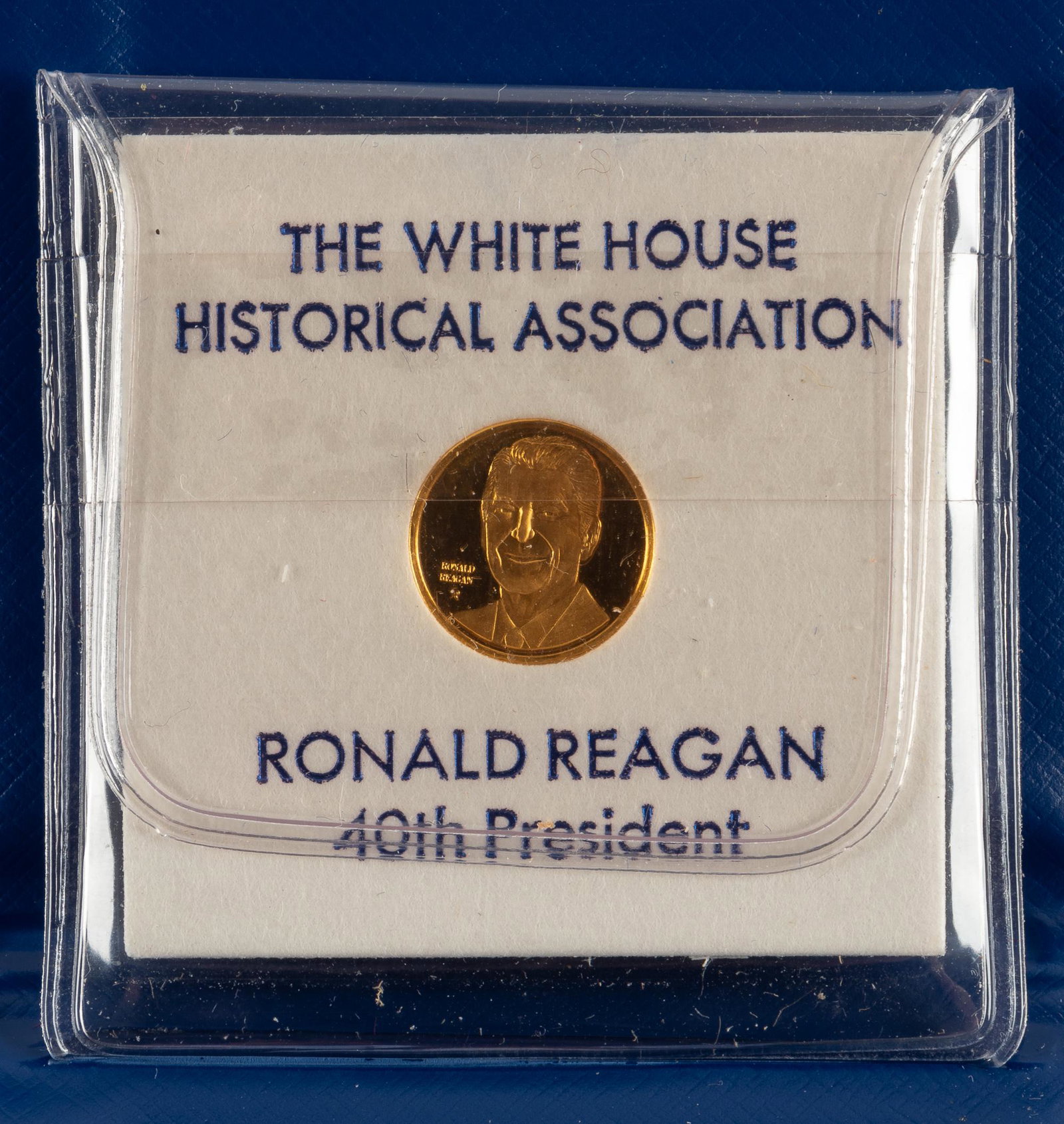 Ronald Reagan 24KT Gold Coin: 1.1 dwt. Produced by the Franklin Mint for the White House Historical Association. IMPORTANT: Before bidding, please read the terms and conditions. When you registered for the auction you agreed to th