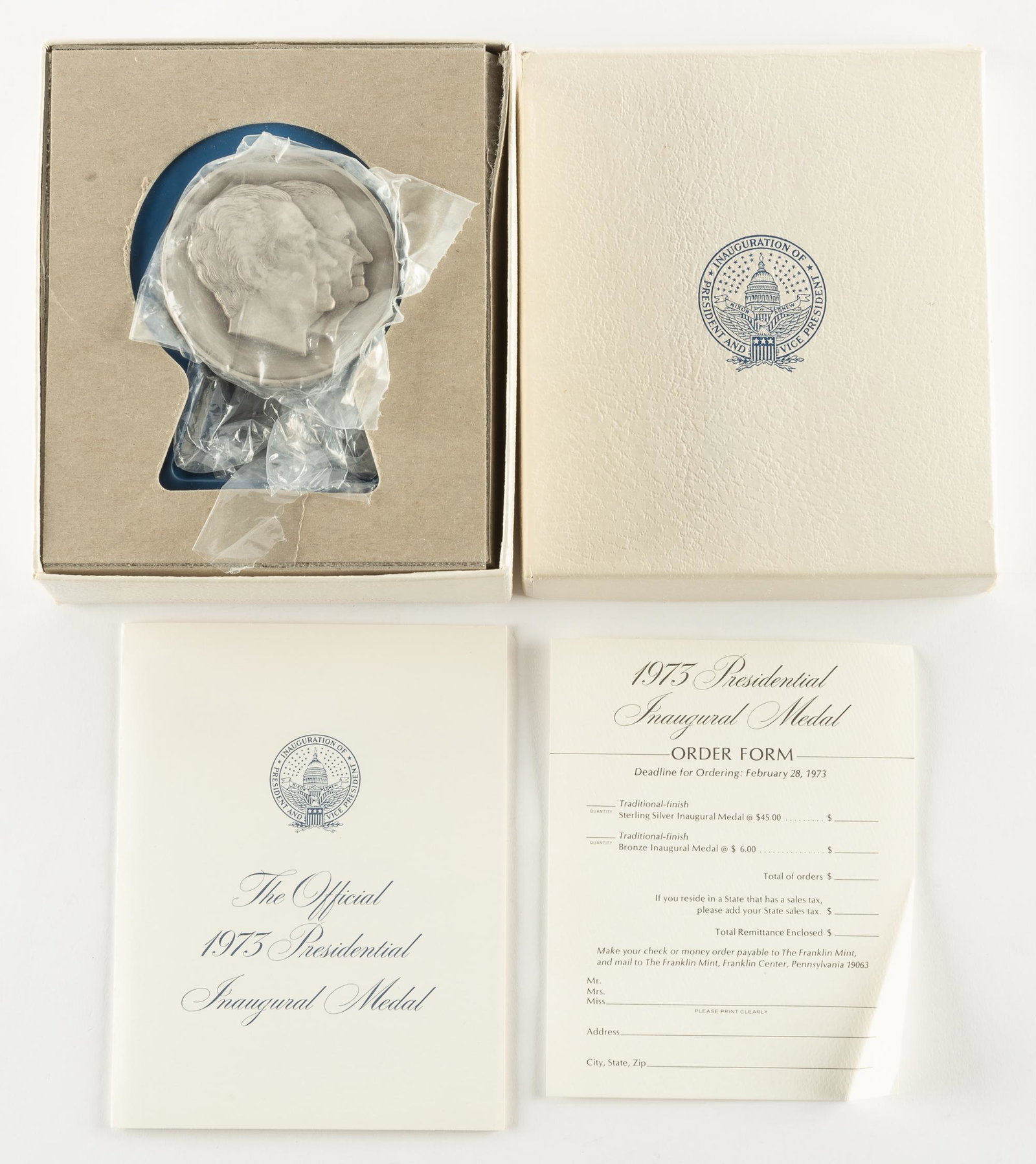 1973 Presidential Inaugural Medal: Sterling silver medal produced by the Franklin Mint to commemorate the inauguration of Richard Nixon. Profile of Nixon and Agnew on the face and Presidential Seal on the reverse. In original box with 