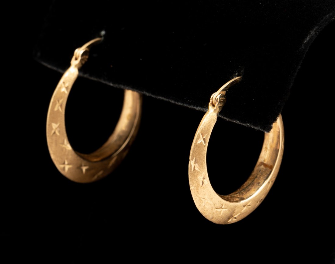 14K Hoop Earrings: 1" long. 1.2 dwt. IMPORTANT: Before bidding, please read the terms and conditions. When you registered for the auction you agreed to these terms and will be required to comply with them.