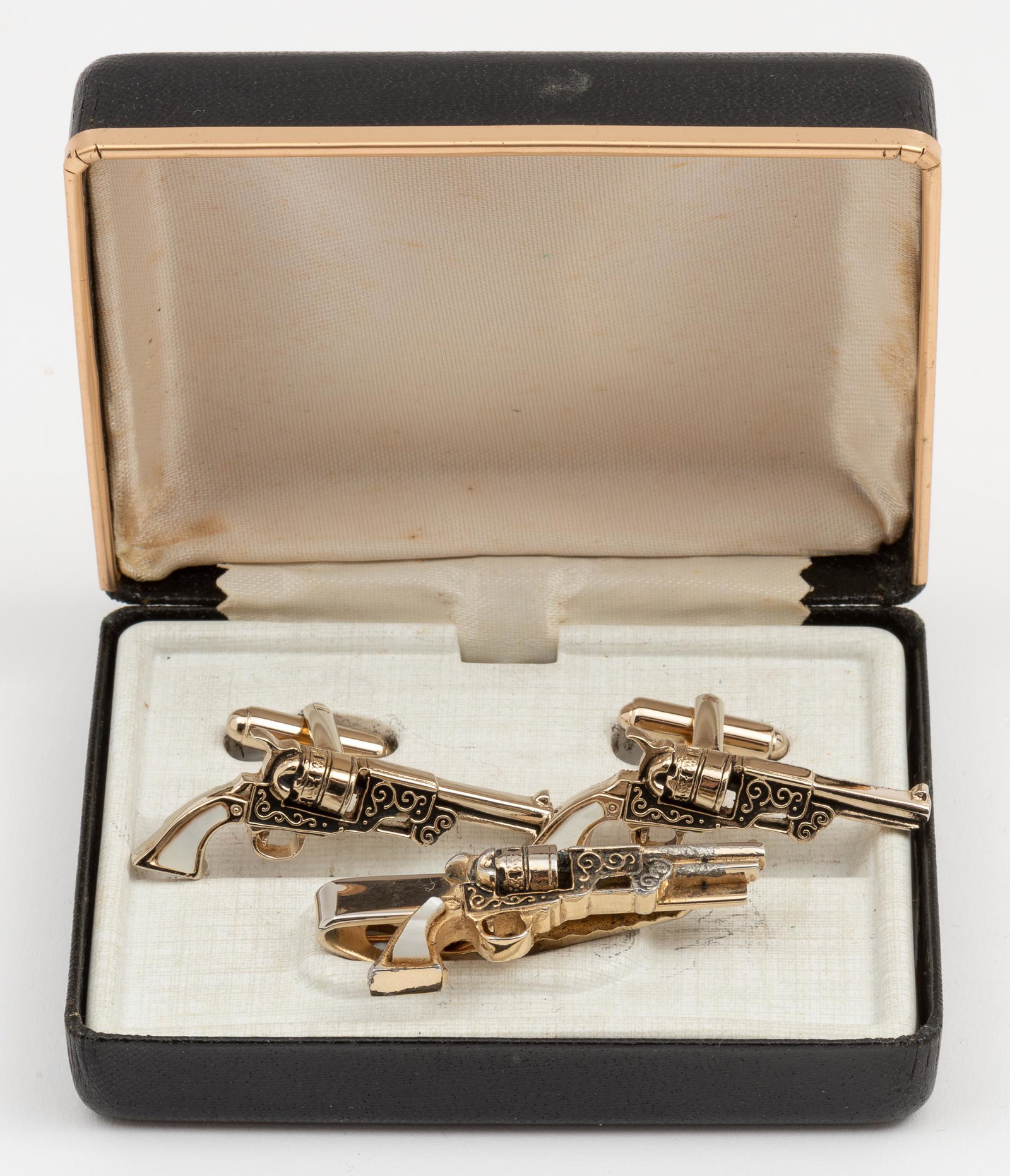Revolver Cufflink & Tie Bar Set: Cufflinks 1-1/2" long. Tie bar 1-3/4" long. In original box. IMPORTANT: Before bidding, please read the terms and conditions. When you registered for the auction you agreed to these terms and will be 
