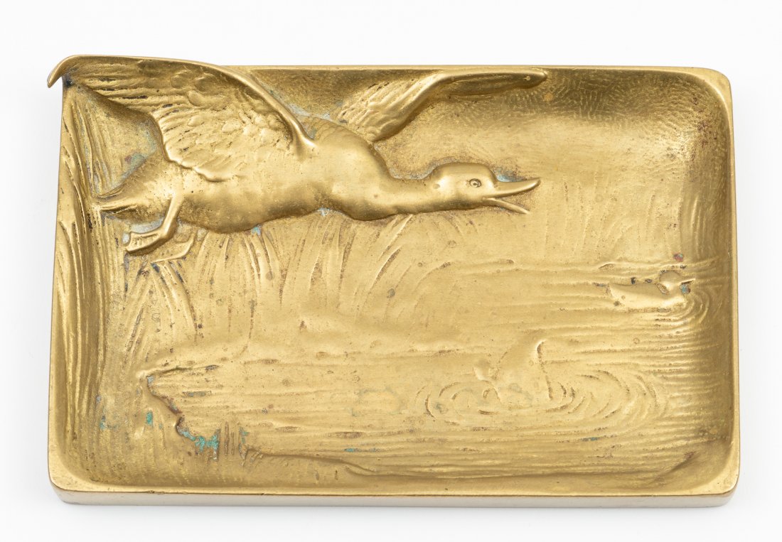 Bronze Pin Tray: Bronze pin tray with flying duck. 4-1/2" long x 3" wide. IMPORTANT: Before bidding, please read the terms and conditions. When you registered for the auction you agreed to these terms and will be requ