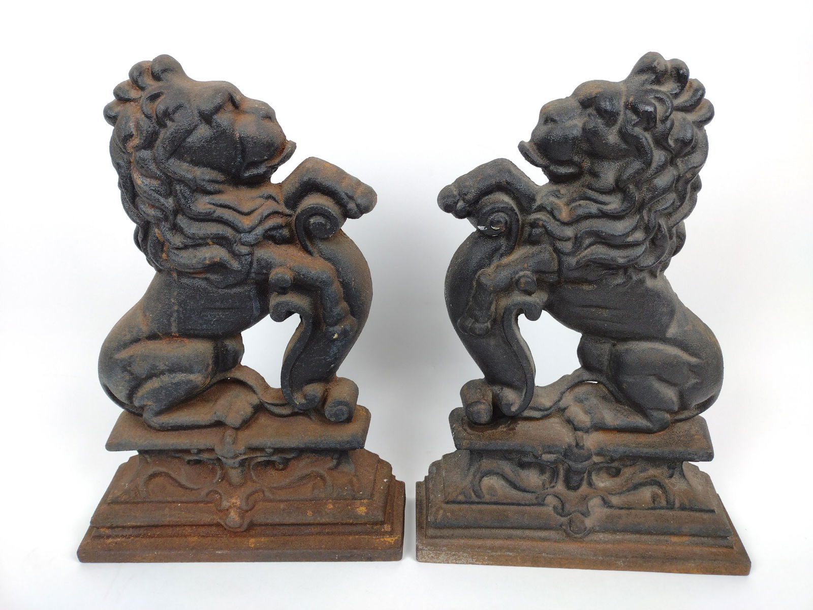 Pr Cast Iron Lion Doorstops: 9-1/2" wide X 3" deep X 14" high. DM IMPORTANT: Before bidding, please read the terms and conditions. When you registered for the auction you agreed to these terms and will be required to comply with