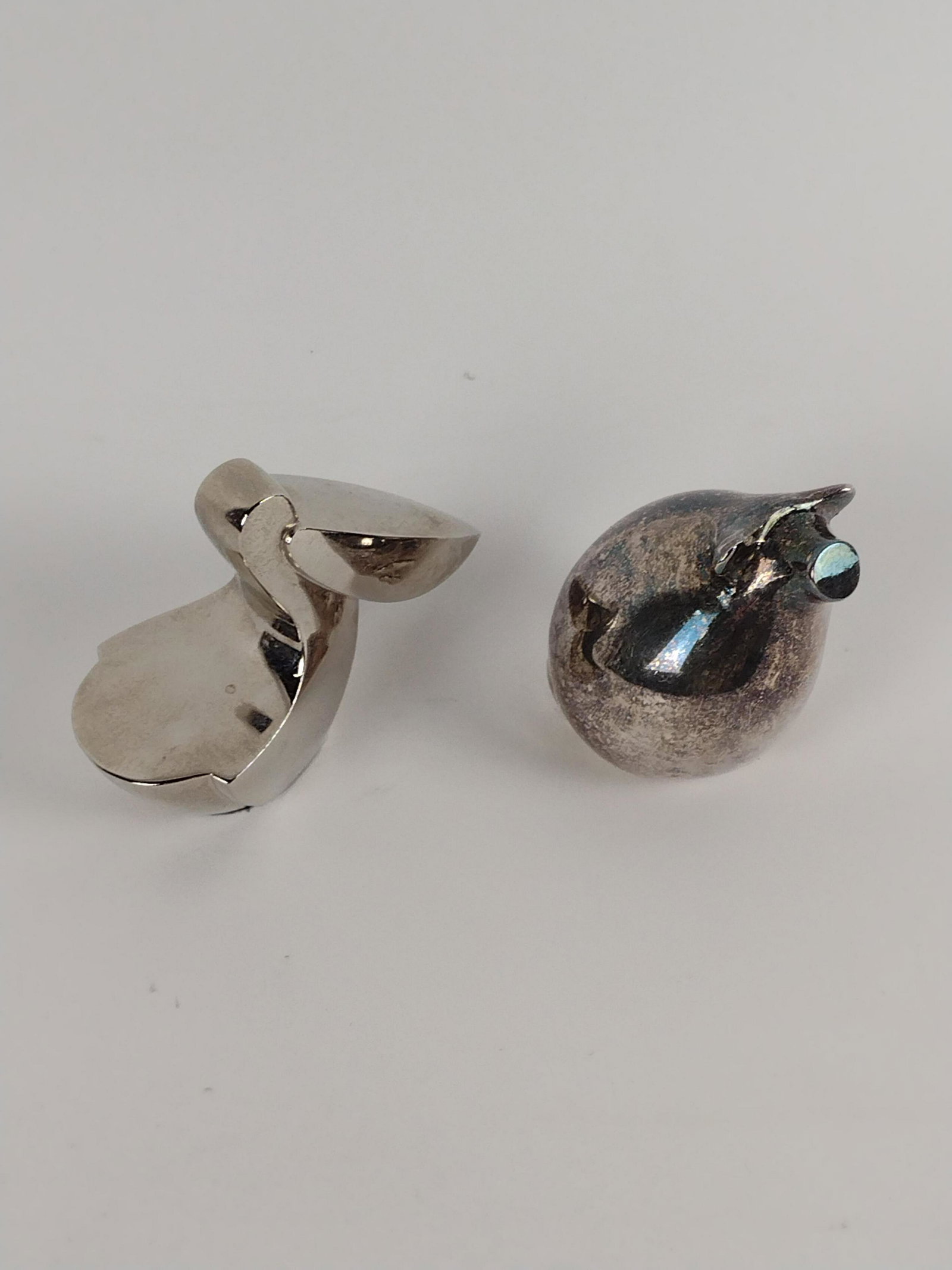 2 Dansk Plated Animals: 1 3/4" to 3" wide x 1 3/4" to 2 1/4" high. Pig is silver plated and pelican is nickel plated. JK IMPORTANT: Before bidding, please read the terms and conditions. When you registered for the auction yo