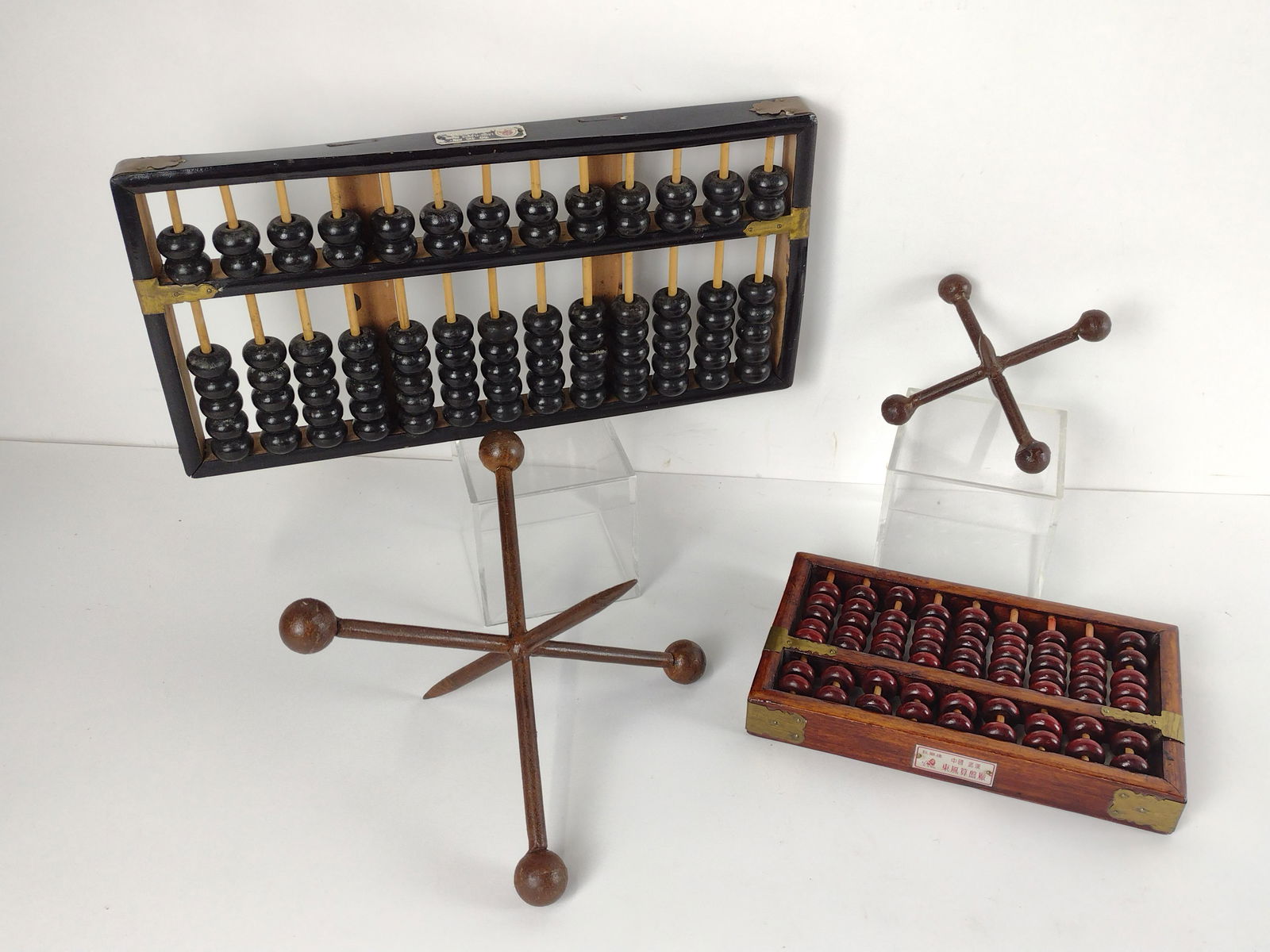 2 Abacuses and 2 Decorative Jacks: 5" to 14-3/4" wide X 3" to 7-1/4" high. LR IMPORTANT: Before bidding, please read the terms and conditions. When you registered for the auction you agreed to these terms and will be required to comply