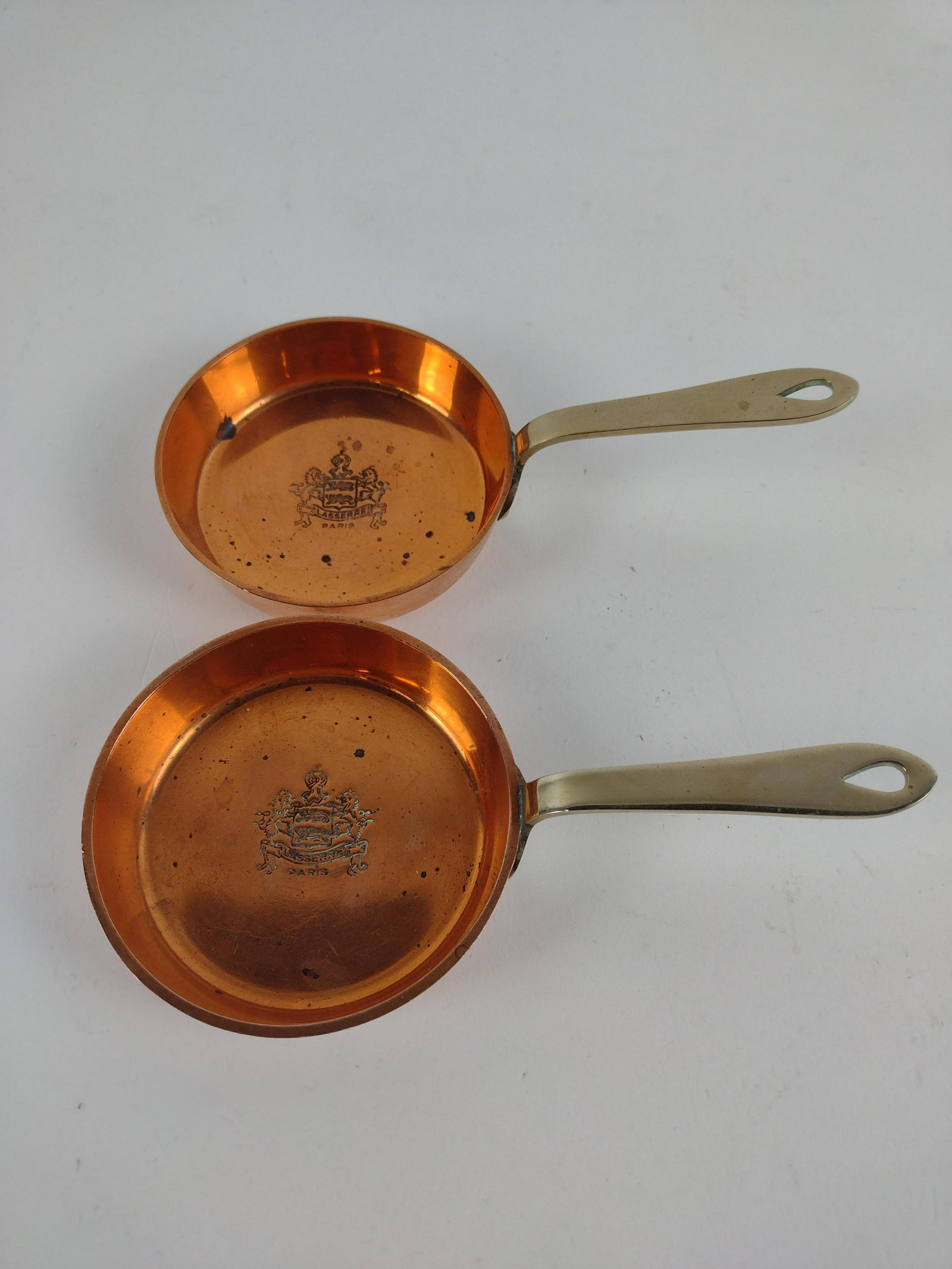 2 Restaurant Lasserre French Wine Tasters: 6" wide x 1 1/2" high. JK IMPORTANT: Before bidding, please read the terms and conditions. When you registered for the auction you agreed to these terms and will be required to comply with them.