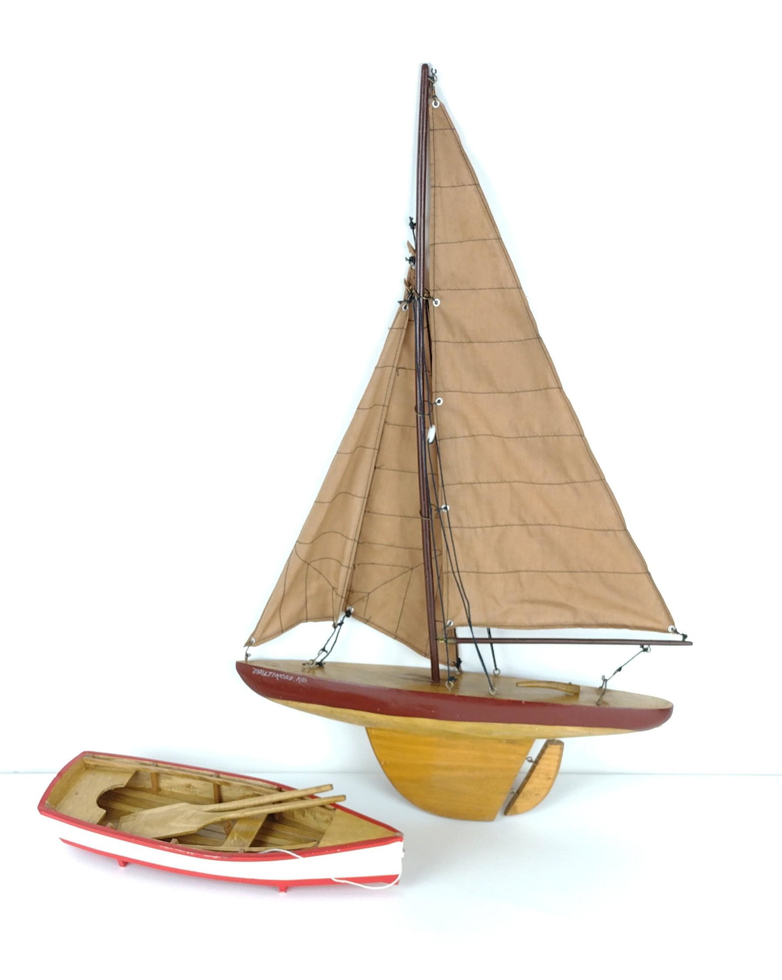 2 Pond Boats: 2" to 25" high x 12-3/4" to 15-1/2" long x 3-1/2" to 4" wide. Railing to small boat detached. DP. IMPORTANT: Before bidding, please read the terms and conditions. When you registered for the auction y