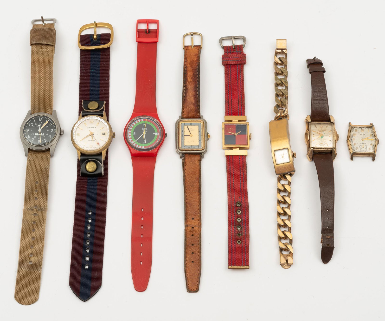 Eight Wristwatches incl Hamilton Khaki: Khaki 1-3/4" lug to lug on 10" band, crack to crystal. MH IMPORTANT: Before bidding, please read the terms and conditions. When you registered for the auction you agreed to these terms and will be req