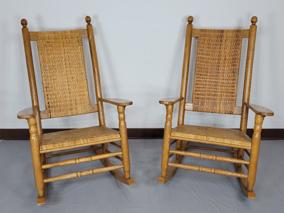 Two Carolina Rockers: 27 1/2" wide X 32 1/2" deep X 42" high. A few Wicker bands are broken. MG.