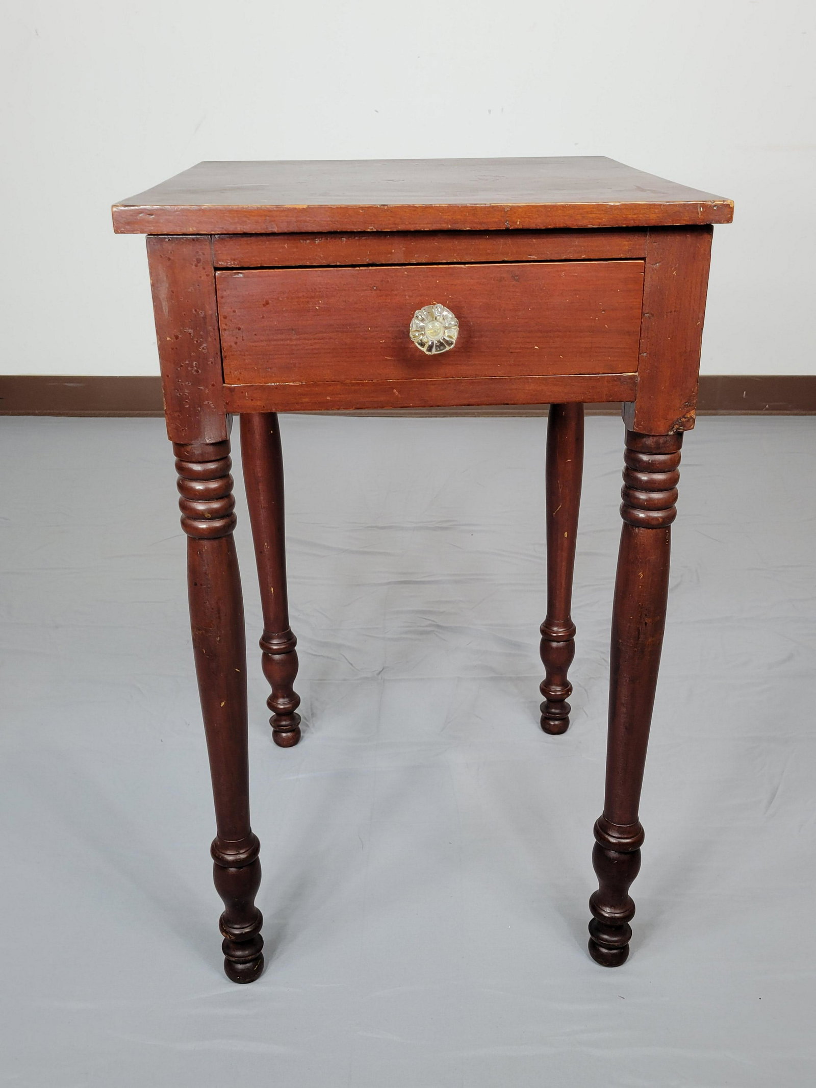 Single Drawer Work Table: 16 3/4" wide X 18 1/4" deep X 27 1/2" high. Some scratches and areas of discoloring. MG. IMPORTANT: Before bidding, please read the terms and conditions. When you registered for the auction you agreed