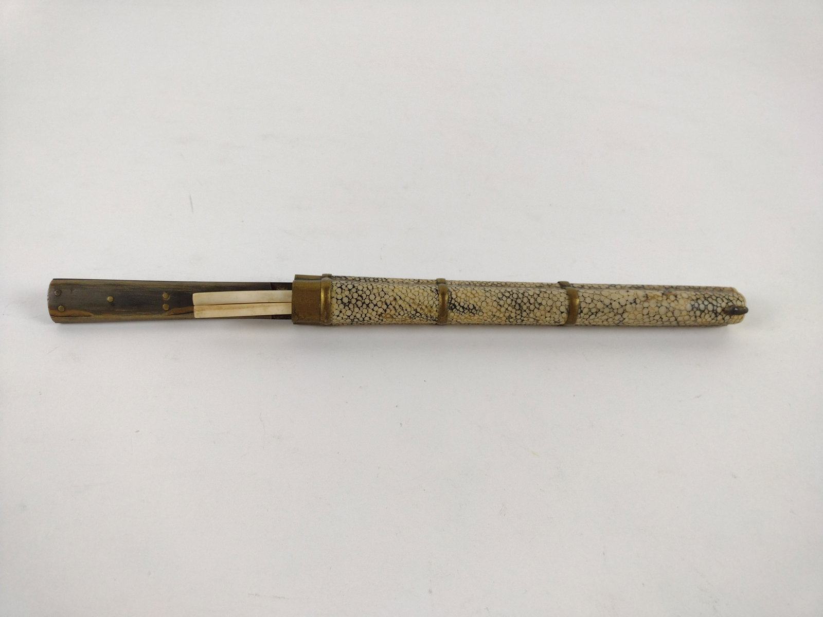 Chinese Trousse Set: Sharkskin case with chopsticks and knife. Knife handle missing piece. 12 1/2" overall. Knife overall length is 11 1/4" blade length is 7". JK IMPORTANT: Before bidding, please read the terms and condi
