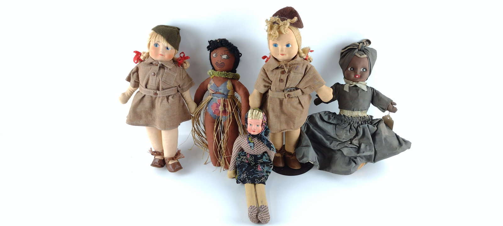 5 Cloth Dolls Incl. Chocolate & Vanilla: Also includes Hawaiian. One on stand. 11-1/4" to 14-1/4" high. DP IMPORTANT: Before bidding, please read the terms and conditions. When you registered for the auction you agreed to these terms and wil