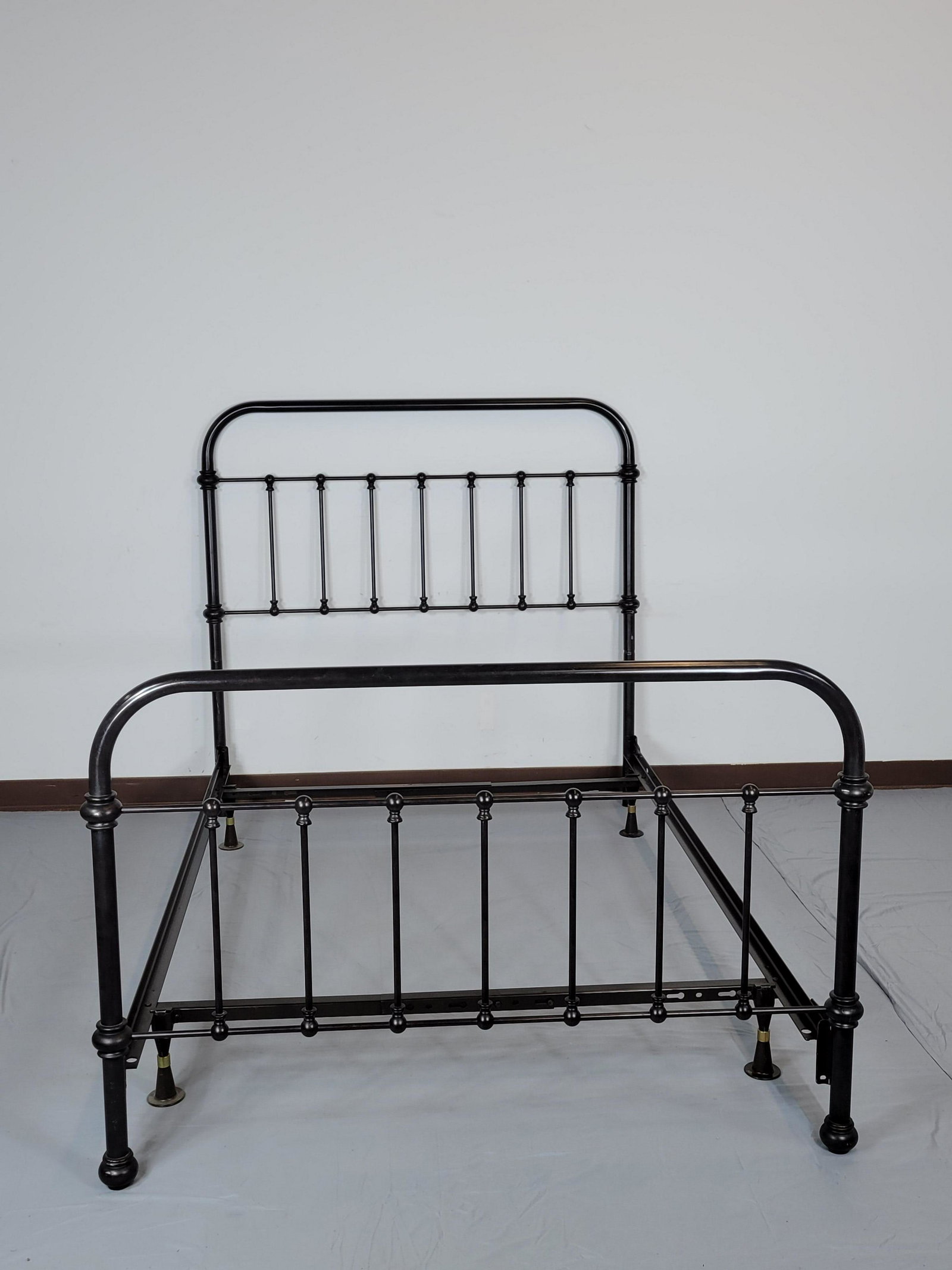 Painted Metal Bed: 54" wide X 82" deep X 52 1/2" high. MG. IMPORTANT: Before bidding, please read the terms and conditions. When you registered for the auction you agreed to these terms and will be required to comply wi