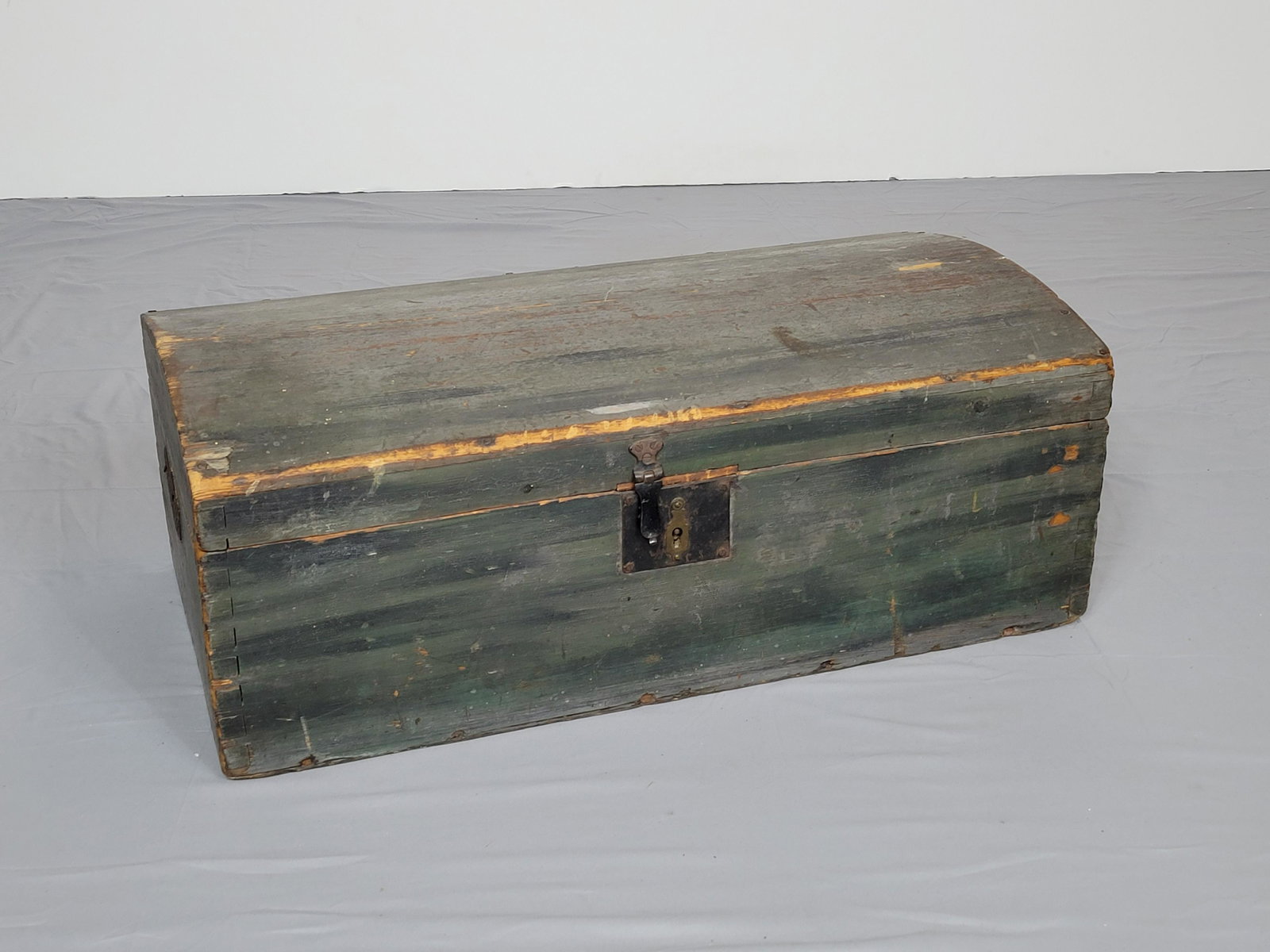Storage Chest: 26 1/2" wide X 14" deep X 10" high. Has some paint loss. MG. IMPORTANT: Before bidding, please read the terms and conditions. When you registered for the auction you agreed to these terms and will be 