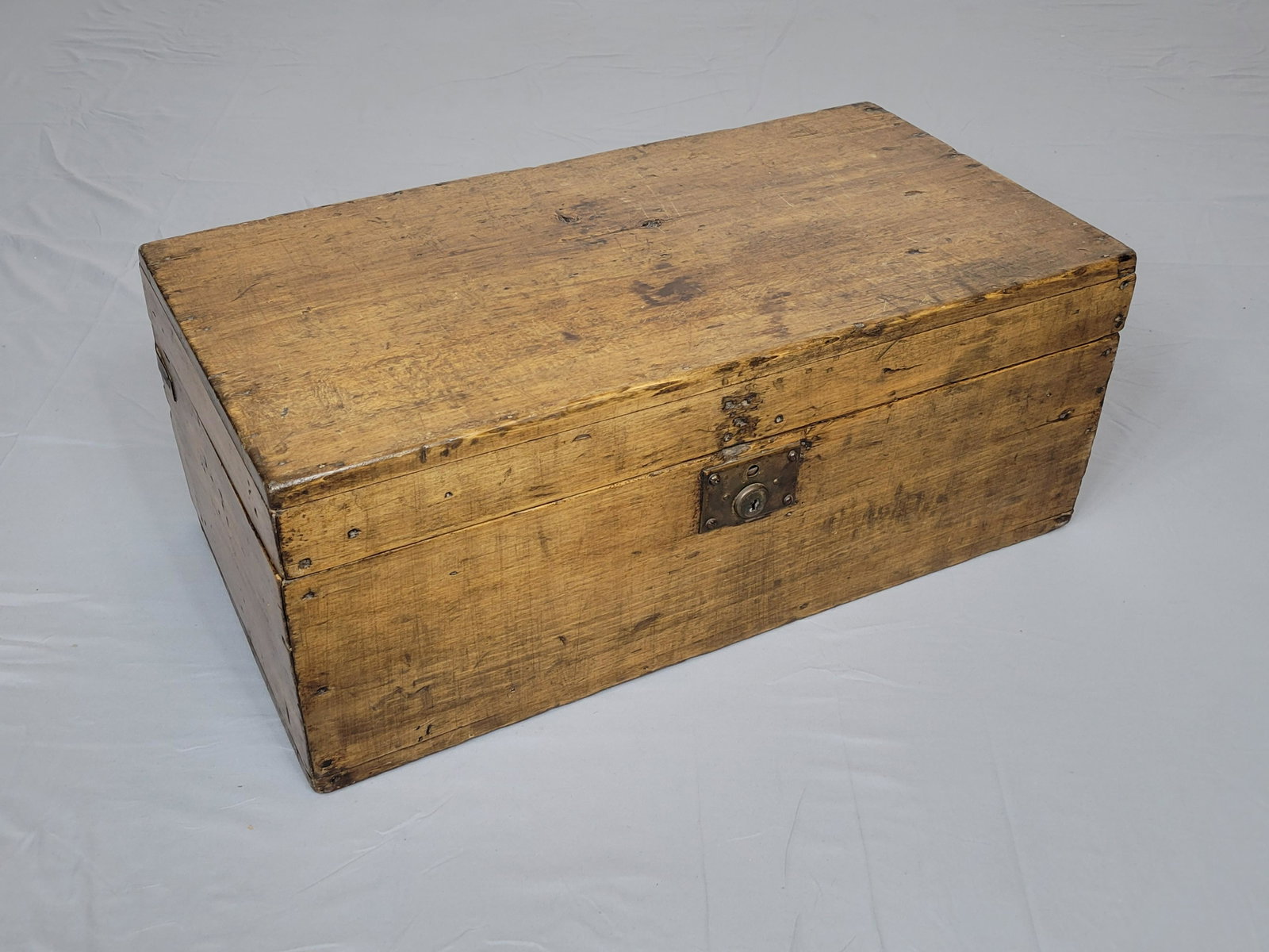 Wooden Trunk: 24" wide X 12 1/2" deep X 9 1/2" high. MG. IMPORTANT: Before bidding, please read the terms and conditions. When you registered for the auction you agreed to these terms and will be required to comply