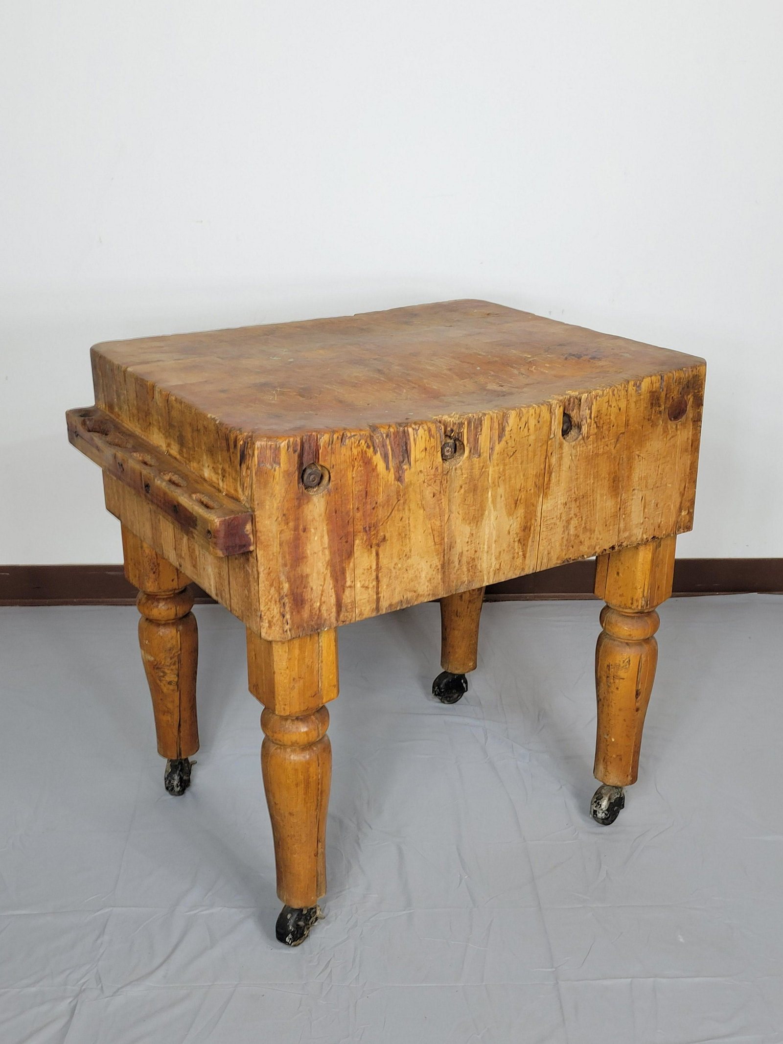 Butcher Block: 24" wide X 32 1/2" deep X 31 1/2" high. MG. IMPORTANT: Before bidding, please read the terms and conditions. When you registered for the auction you agreed to these terms and will be required to compl