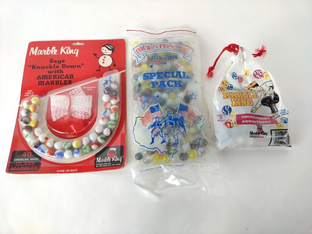 2 Bags Marbles Incl 1 Blister Pack: Also includes Marble King. KE. IMPORTANT: Before bidding, please read the terms and conditions. When you registered for the auction you agreed to these terms and will be required to comply with them.