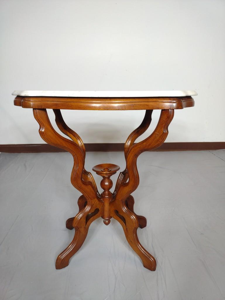 Turtle Top Marble Table: 29 1/2" wide X 19" deep X 29 1/2" high. Top has some scratches and discoloring. MG. IMPORTANT: Before bidding, please read the terms and conditions. When you registered for the auction you agreed to t